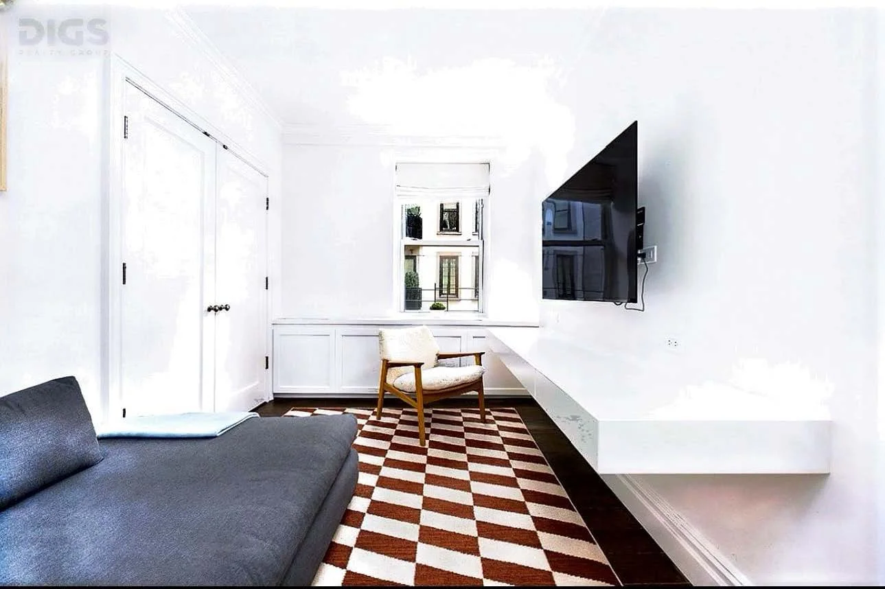 103 east 75 samll bed.jpg