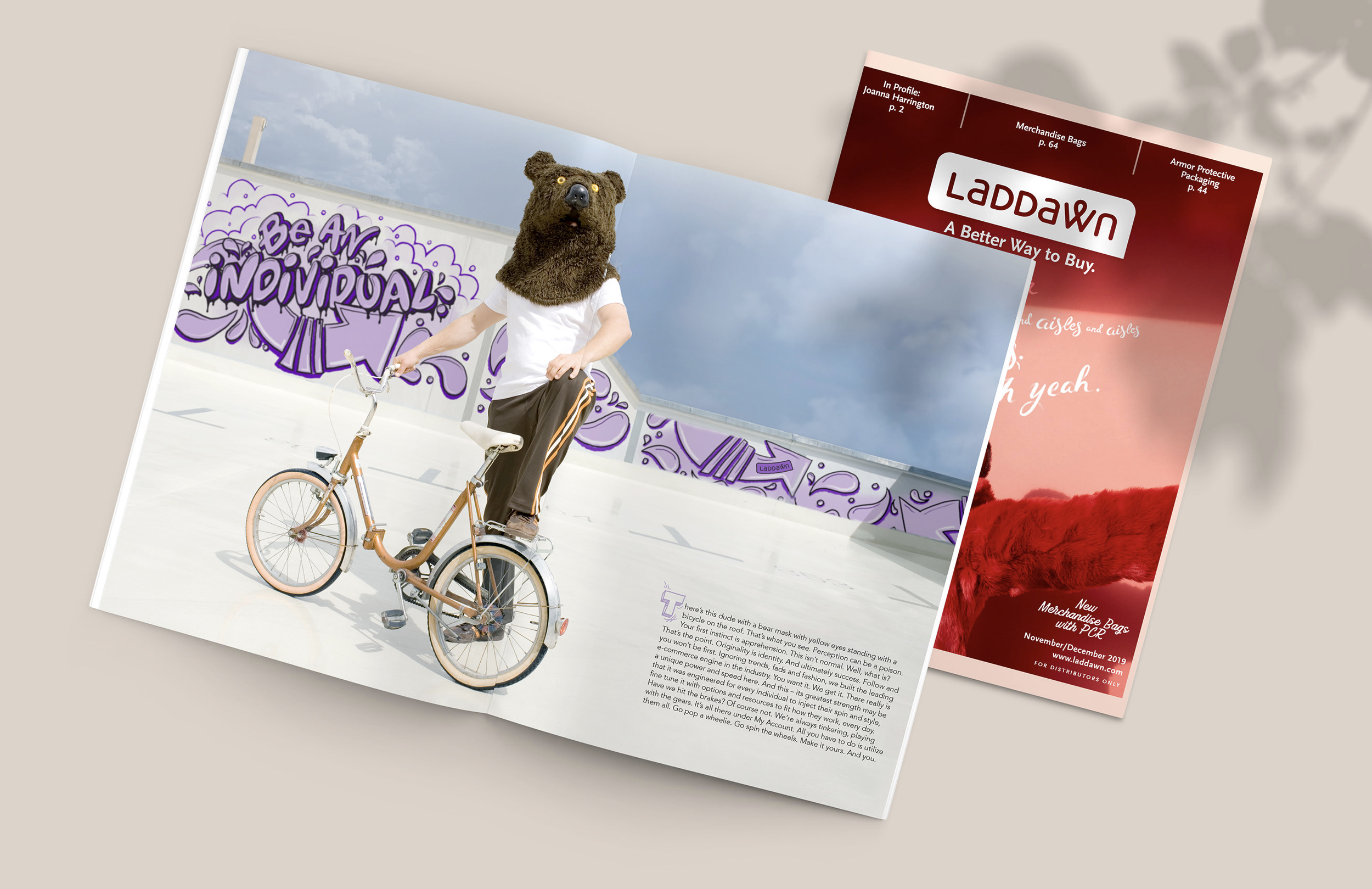 A person riding a bicycle on a rooftop parking lot, wearing a bear mask with yellow eyes. The background includes a wall with graffiti that says 'Be An Individual' and a partly cloudy sky.