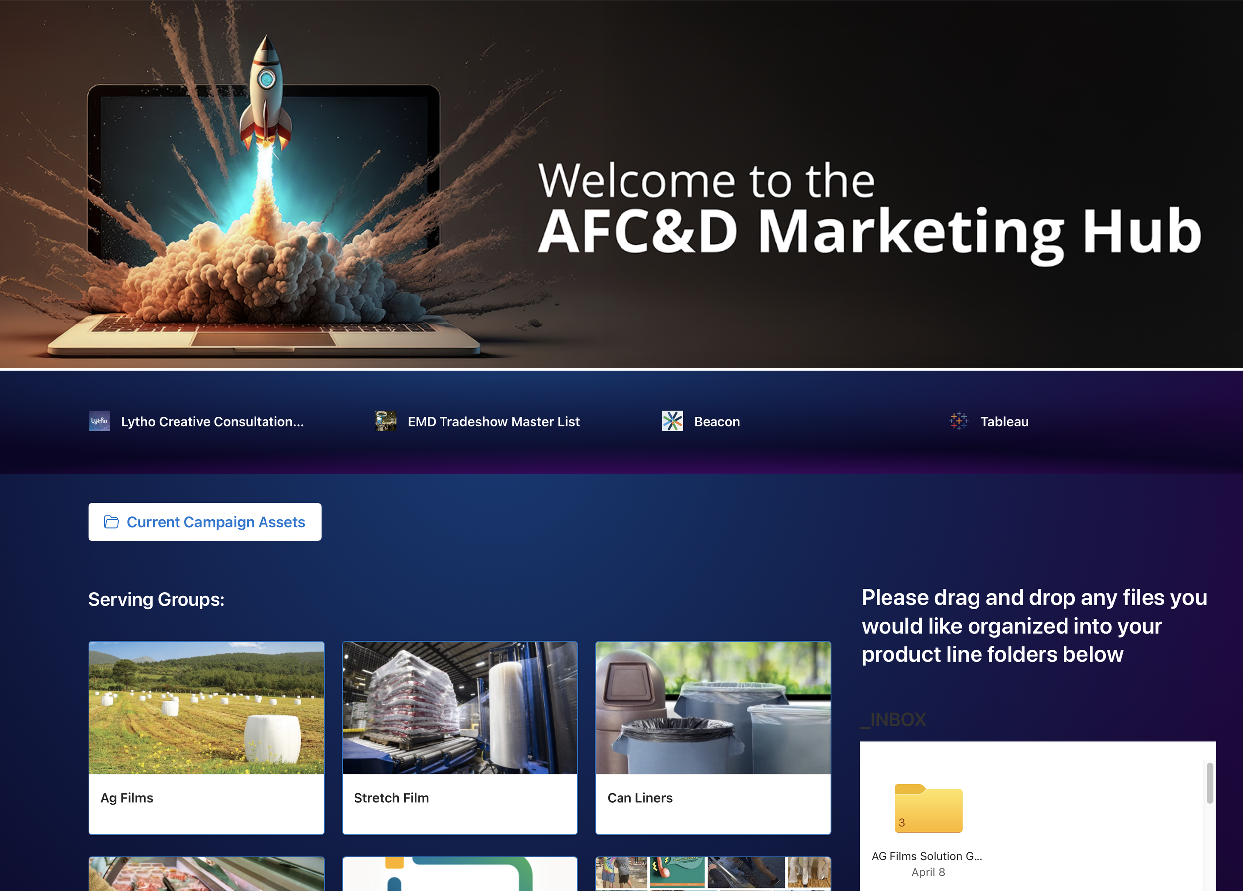 A promotional digital graphic for the AF&C&D Marketing Hub features a rocket launching from a laptop screen, surrounded by smoke and fiery trails, symbolizing innovation and growth.