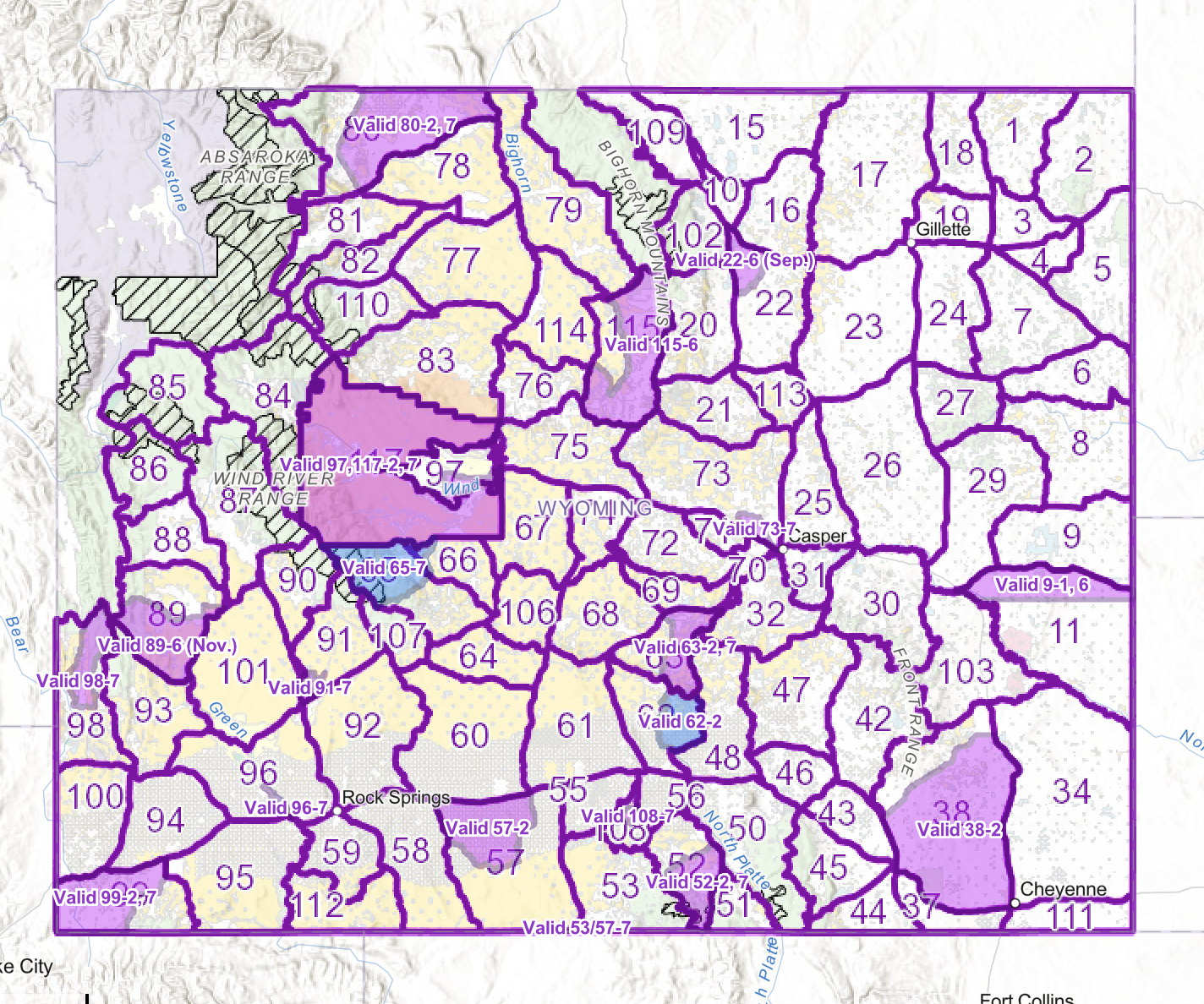 Map of Wyoming with county boundaries highlighted in purple and labels for each county. Some counties have invalid date ranges or notes, and geographic features like lakes and rivers are also visible.