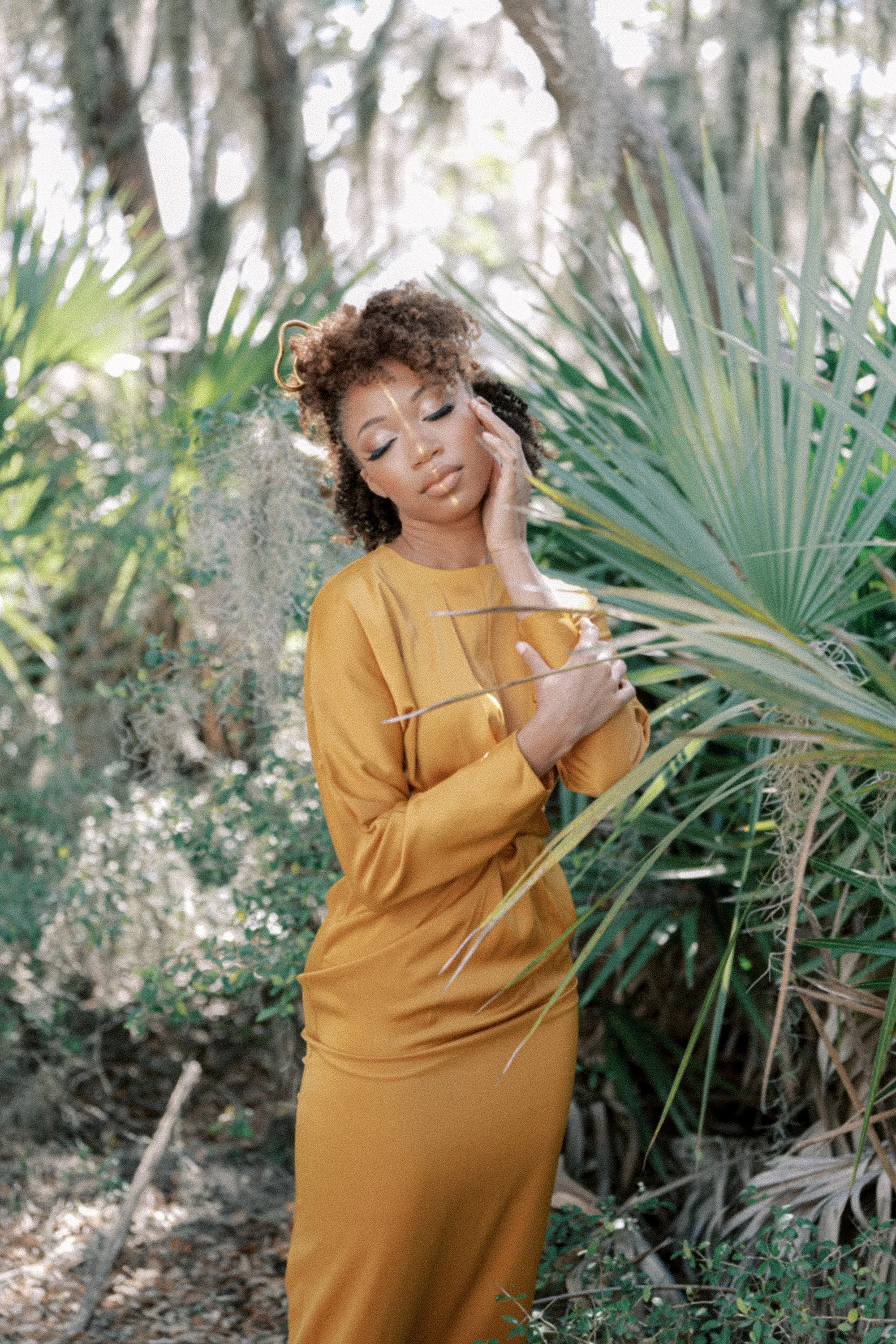 Fine art editorial photoshoot of model in yellow dress