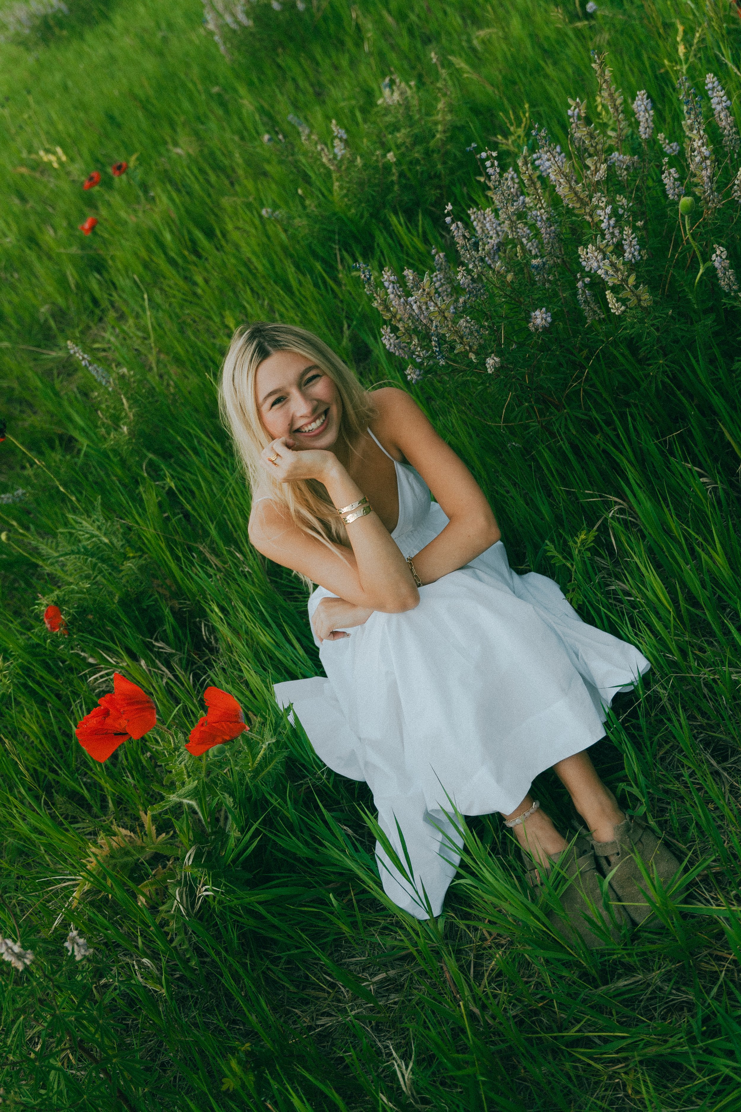  Summer senior portraits at Chautauqua Park in Boulder, Colorado on a windy day with mountain views.   
