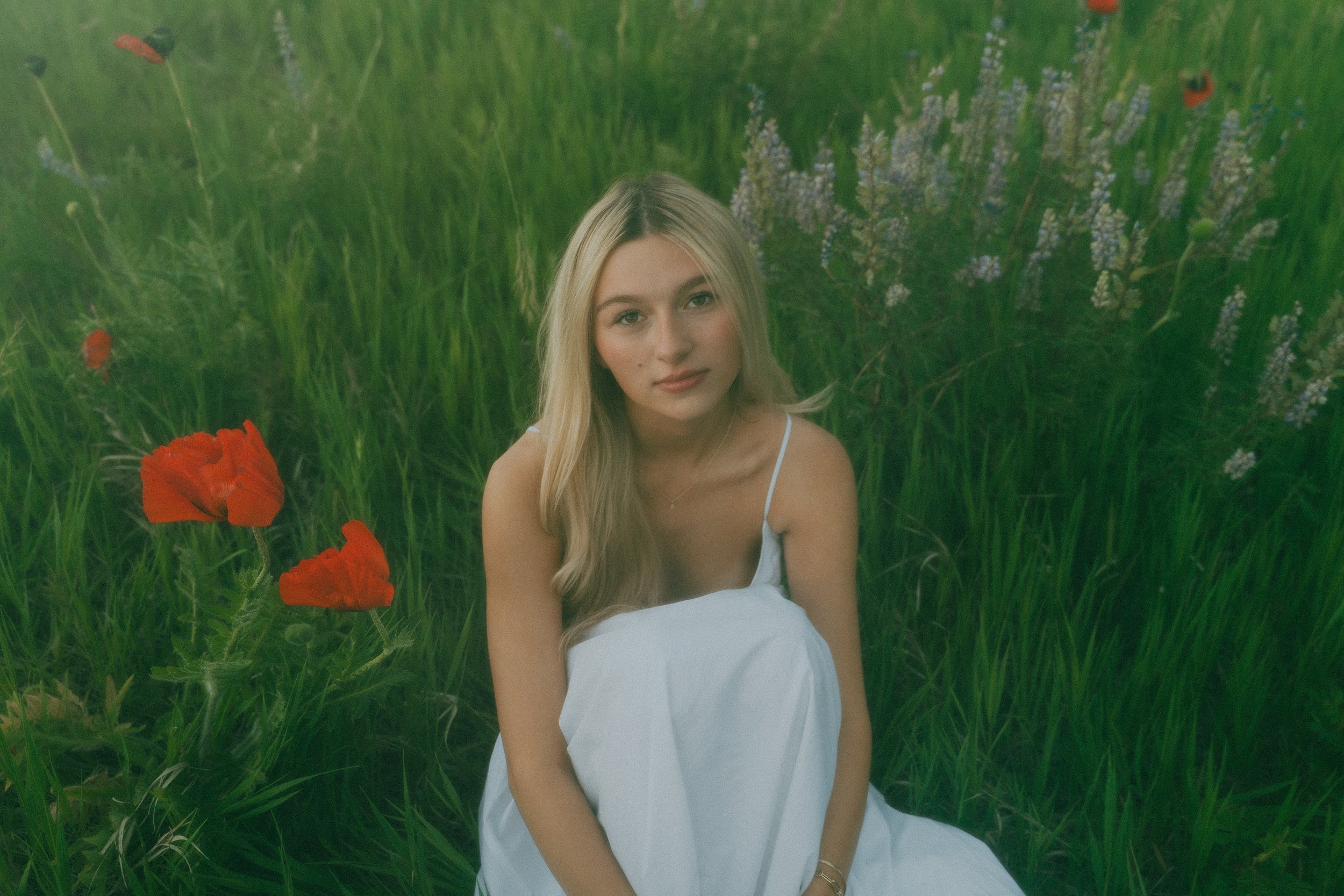  Summer senior portraits at Chautauqua Park in Boulder, Colorado on a windy day with mountain views.   