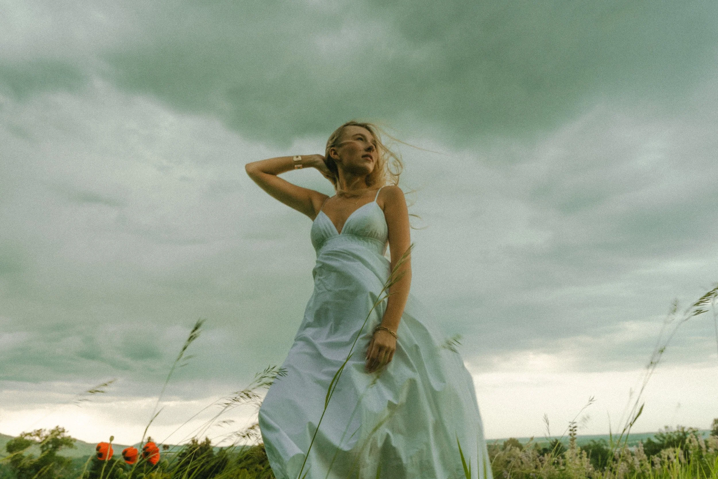  Summer senior portraits at Chautauqua Park in Boulder, Colorado on a windy day with mountain views.   