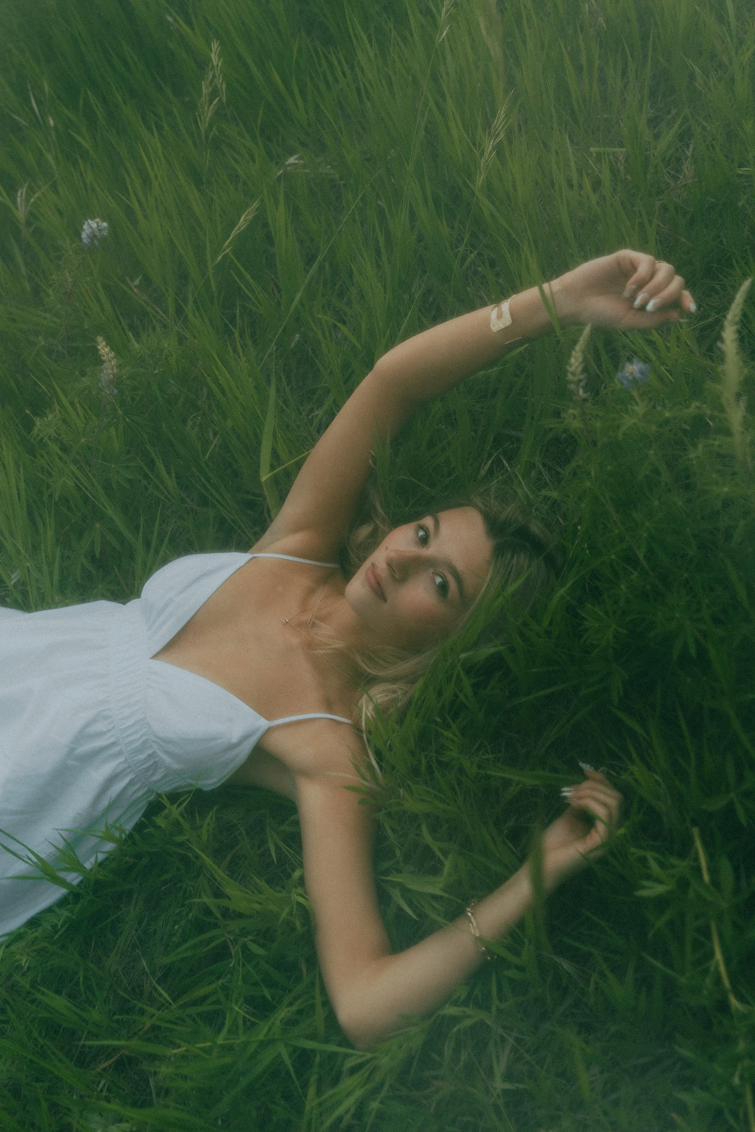  Summer senior portraits at Chautauqua Park in Boulder, Colorado on a windy day with mountain views.   