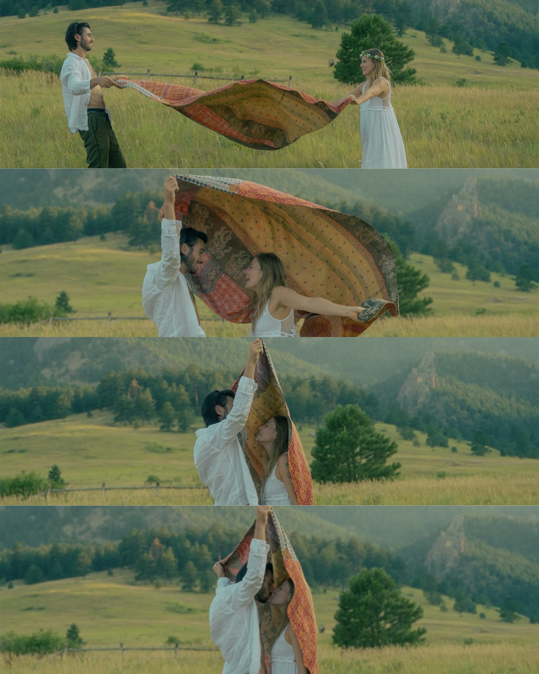 A series of four images shows a man and woman in a grassy field, holding a colorful blanket, with the woman initially smiling and the man lifting the blanket over their heads, creating a playful moment against a scenic backdrop of trees, hills, and distant mountains.