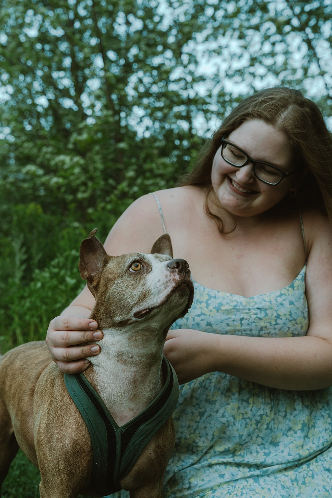 senior photos of a girl and her dog in boulder, colorado