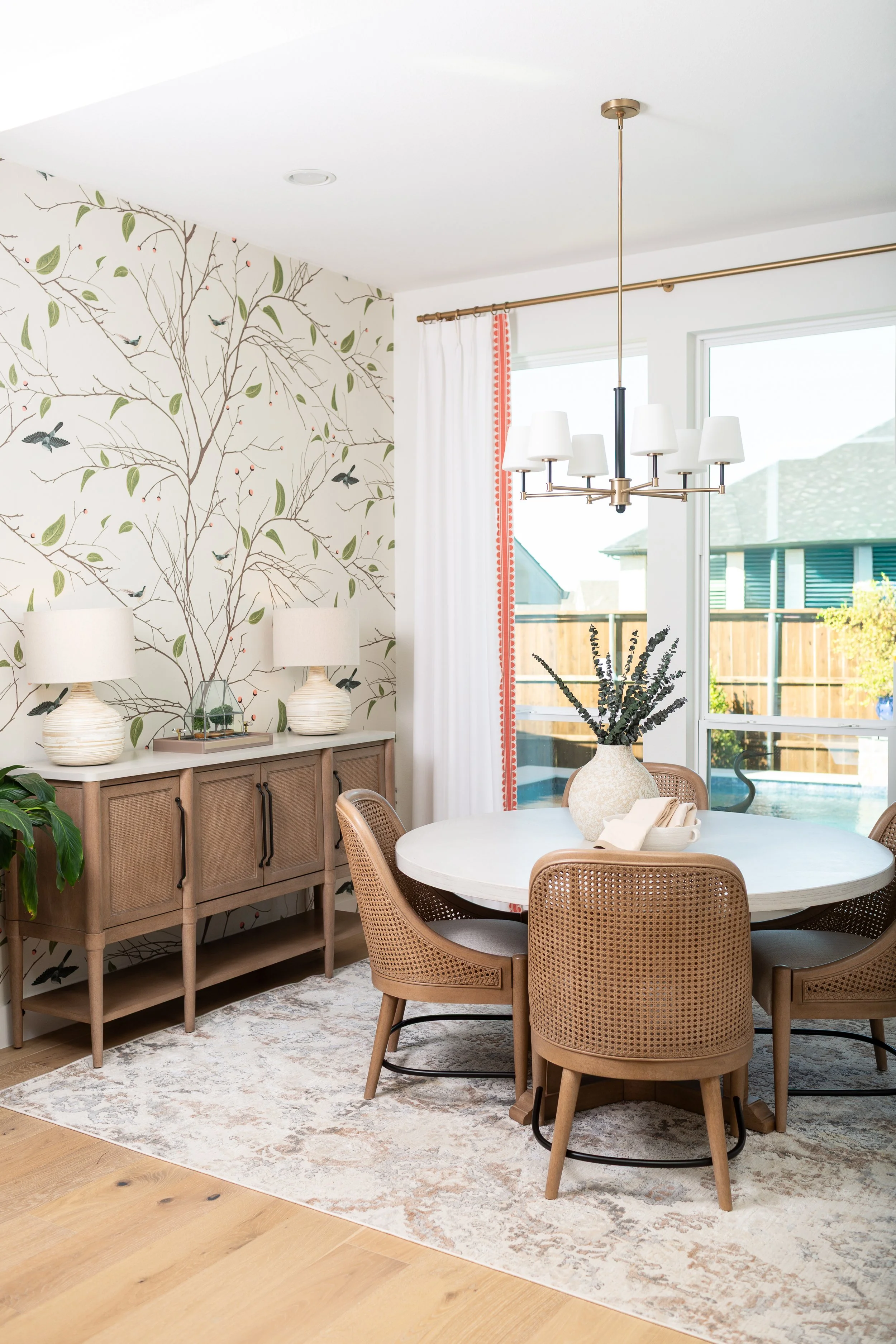 Dining room designed by MASH Habitat Interiors featuring wallpaper, furnishings, and custom design selections.