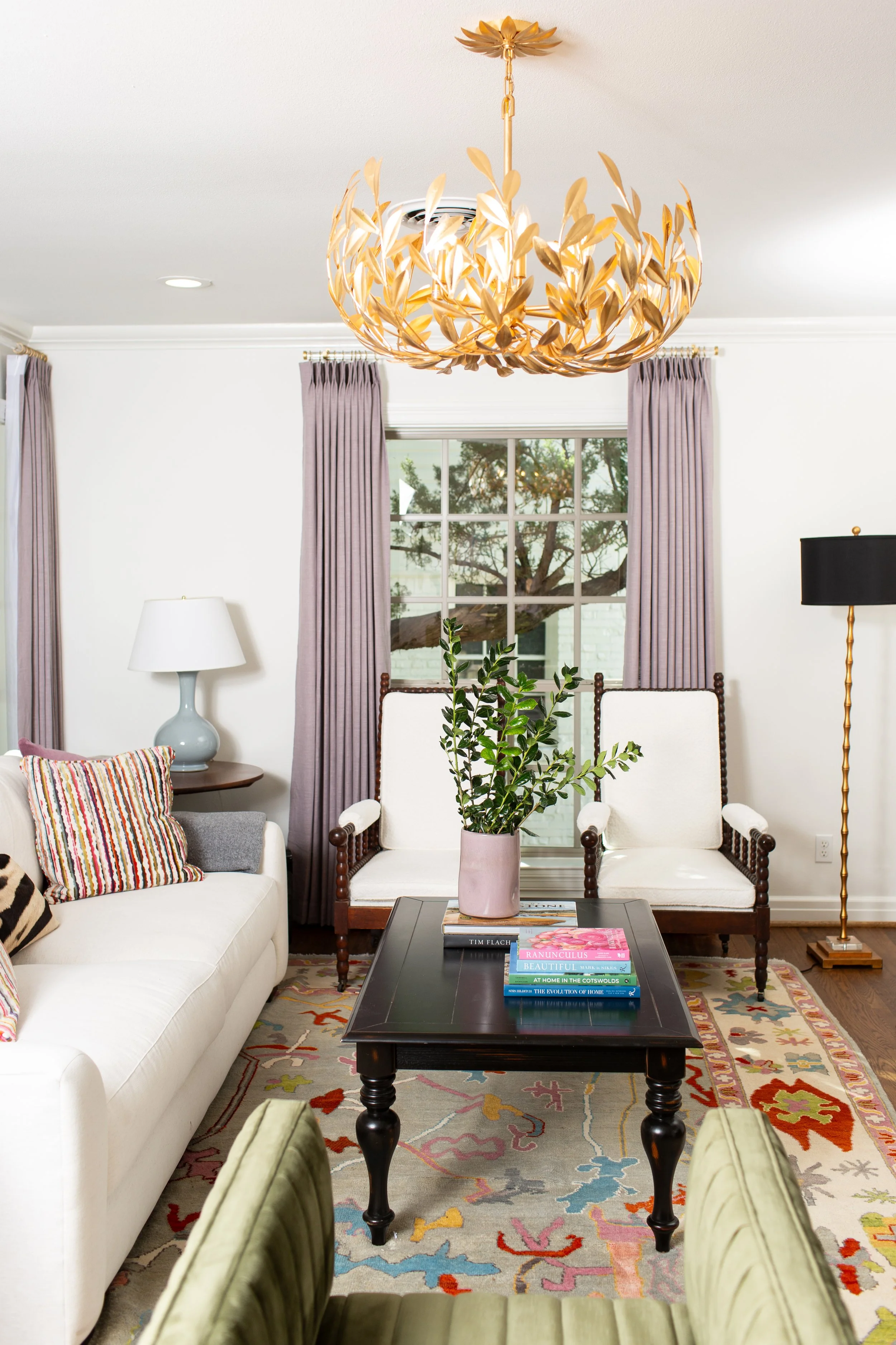 Living room designed by MASH Habitat Interiors showcasing custom furnishings, window treatments, and styling in Fort Worth, Texas.