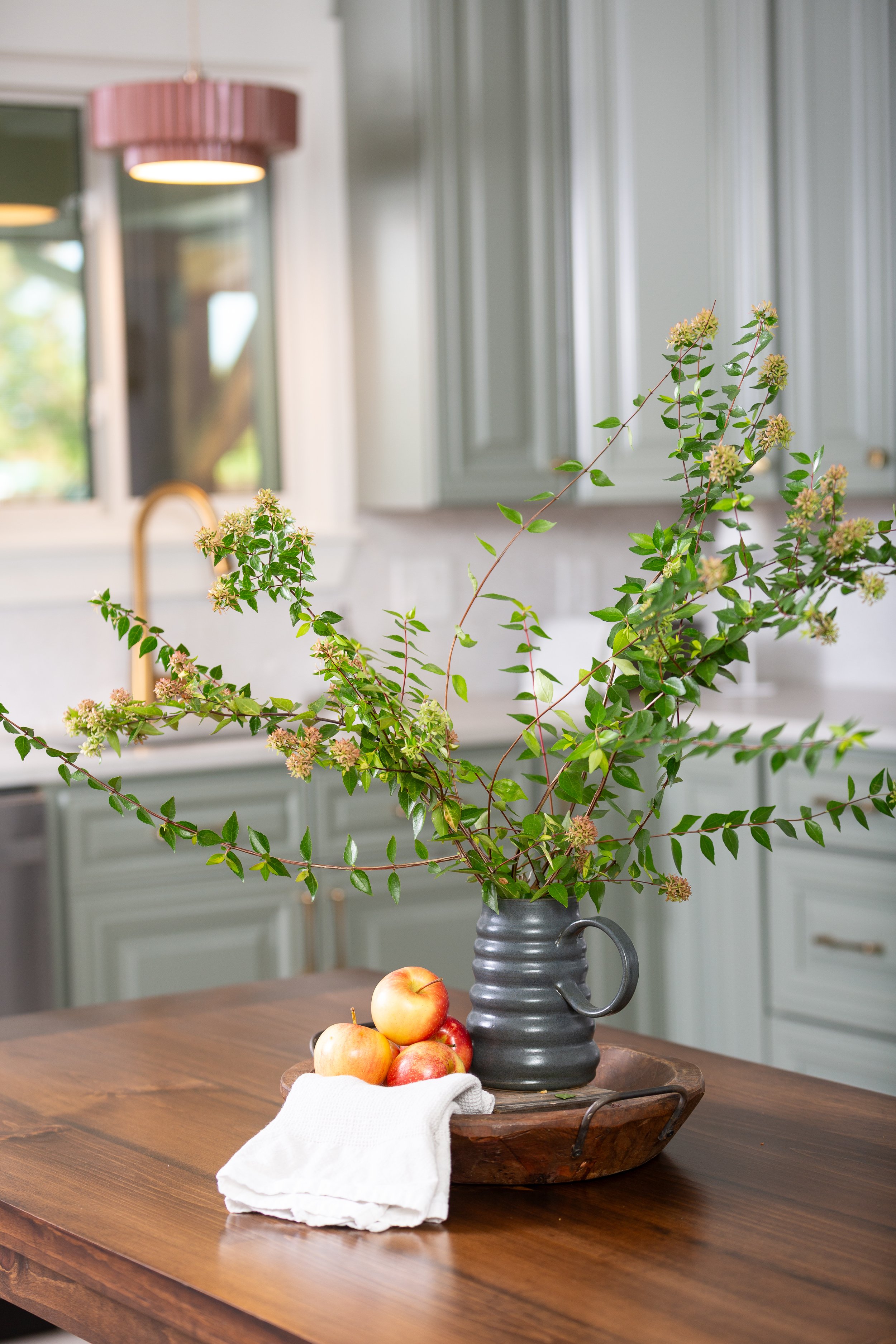 Thoughtfully styled kitchen vignette showcasing natural materials and personalized home design by MASH Habitat Interiors.