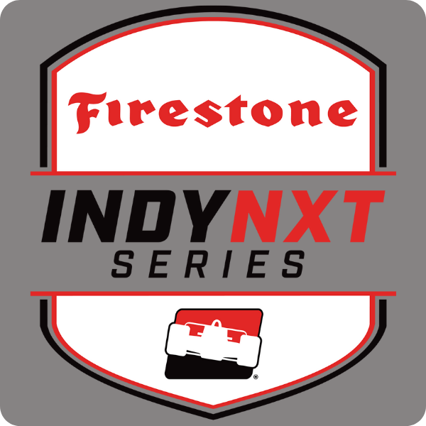 Firestone Indy NXT Series logo featuring a shield shape with red, black, and white colors, and an icon of a tool case at the bottom.