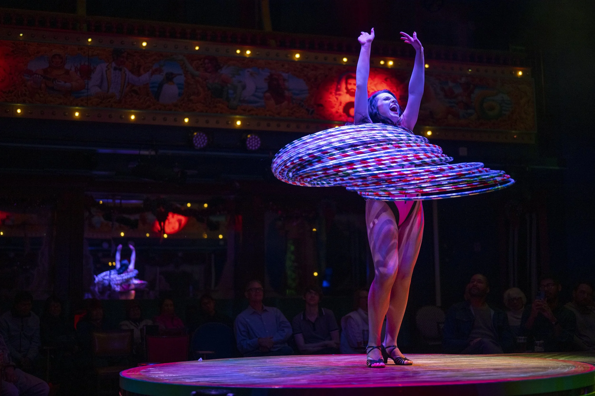 Jesse Patterson performing her Livin’ La Vida Loca hula hoop act at The Hook