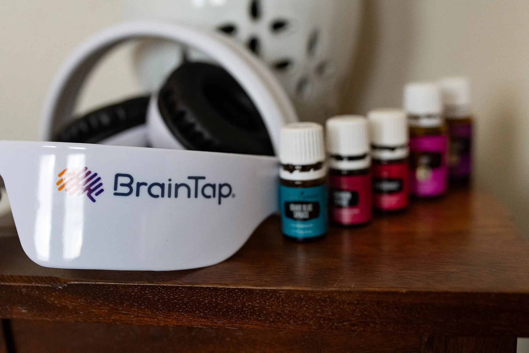 BrainTap headphone paired with essential oils.