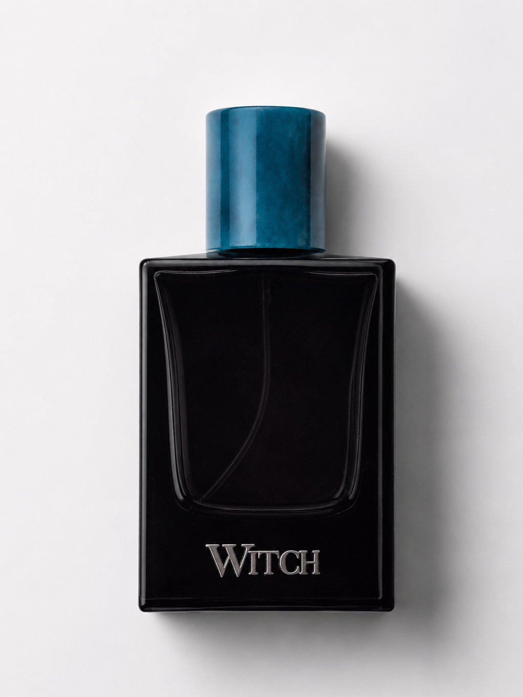 Witch Noumenia perfume bottle with deep green cap on a white background.