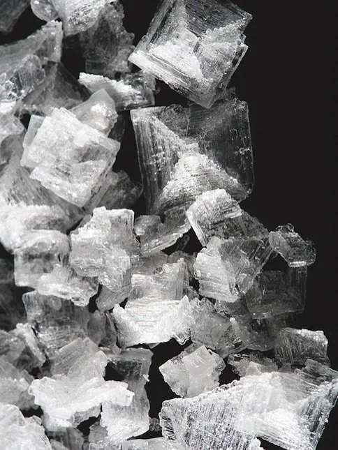Mineral, medicine, mystery. Salt is the common name for the mineral halite, a combination of the metal sodium and chloride, an ion related to the gas chlorine.  The name comes from the Greek halos &ldquo;salt, sea&rdquo; and the suffix &ldquo;ite&rd