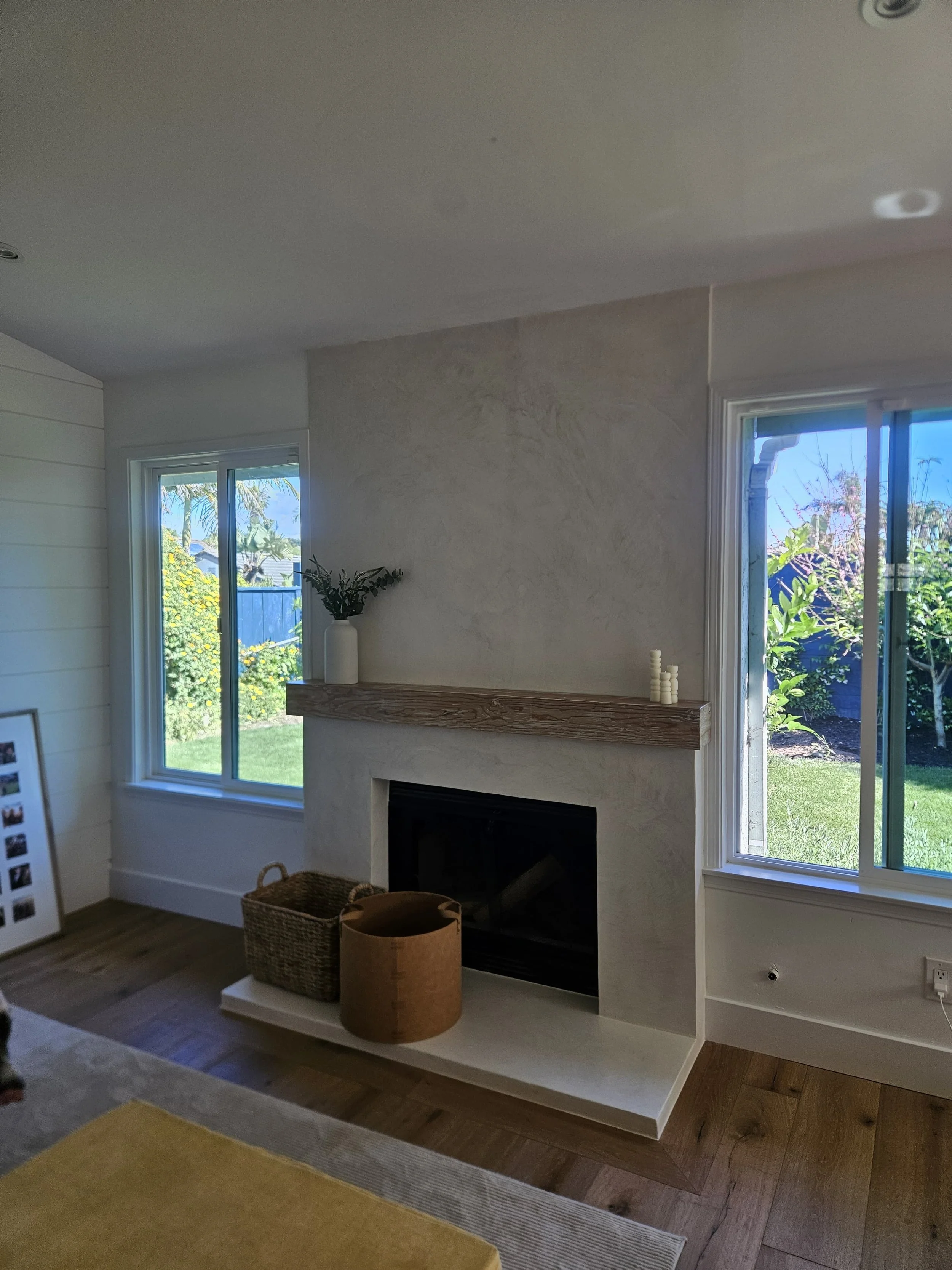 *AFTER* We went over the brick and added to the wall to make it feel like the fireplace was more of a feature.