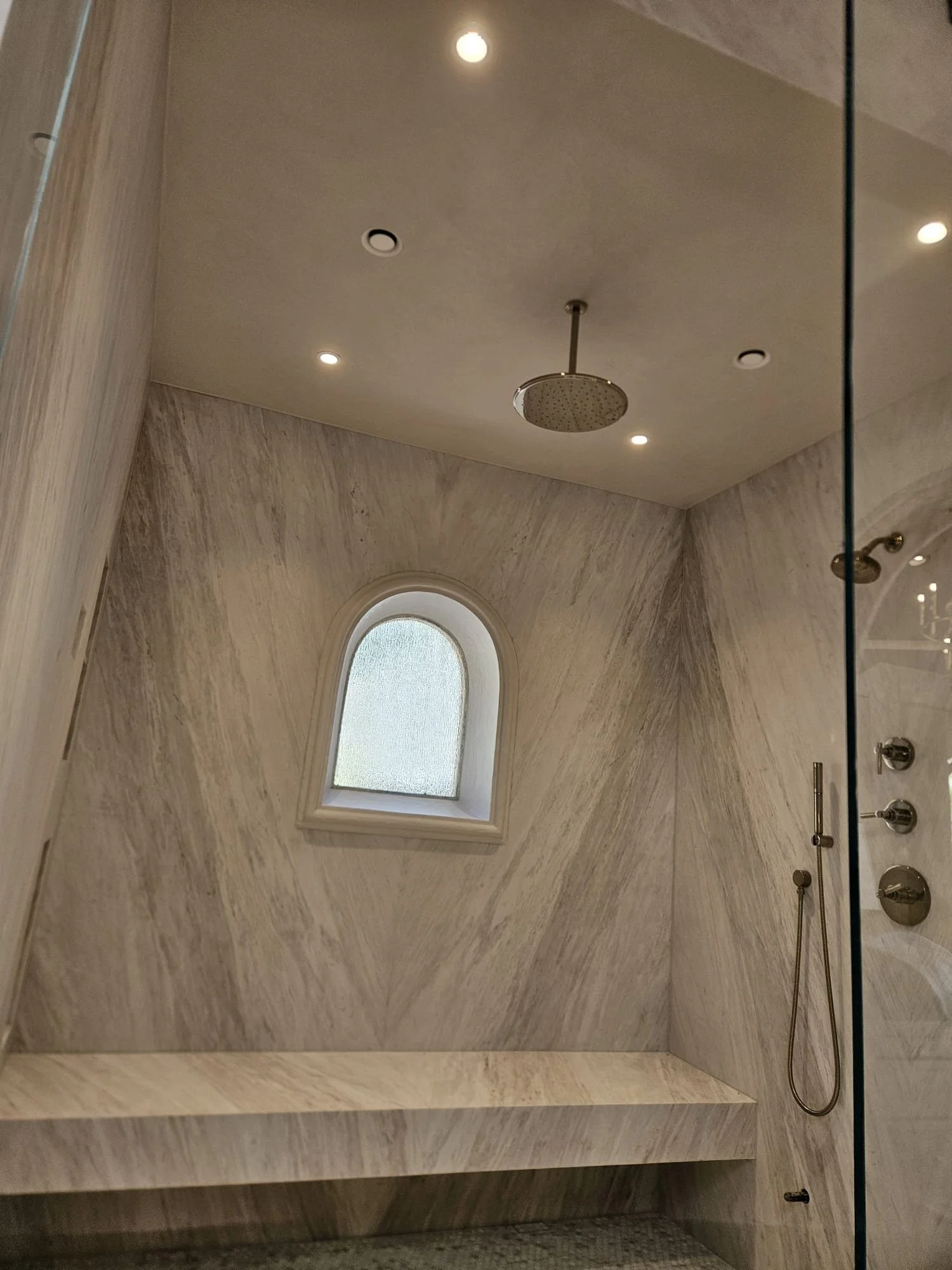 These homeowners had hired another company to microcement this shower ceiling and were unhappy with the end result. We were able to fix it and give them the look they wanted.