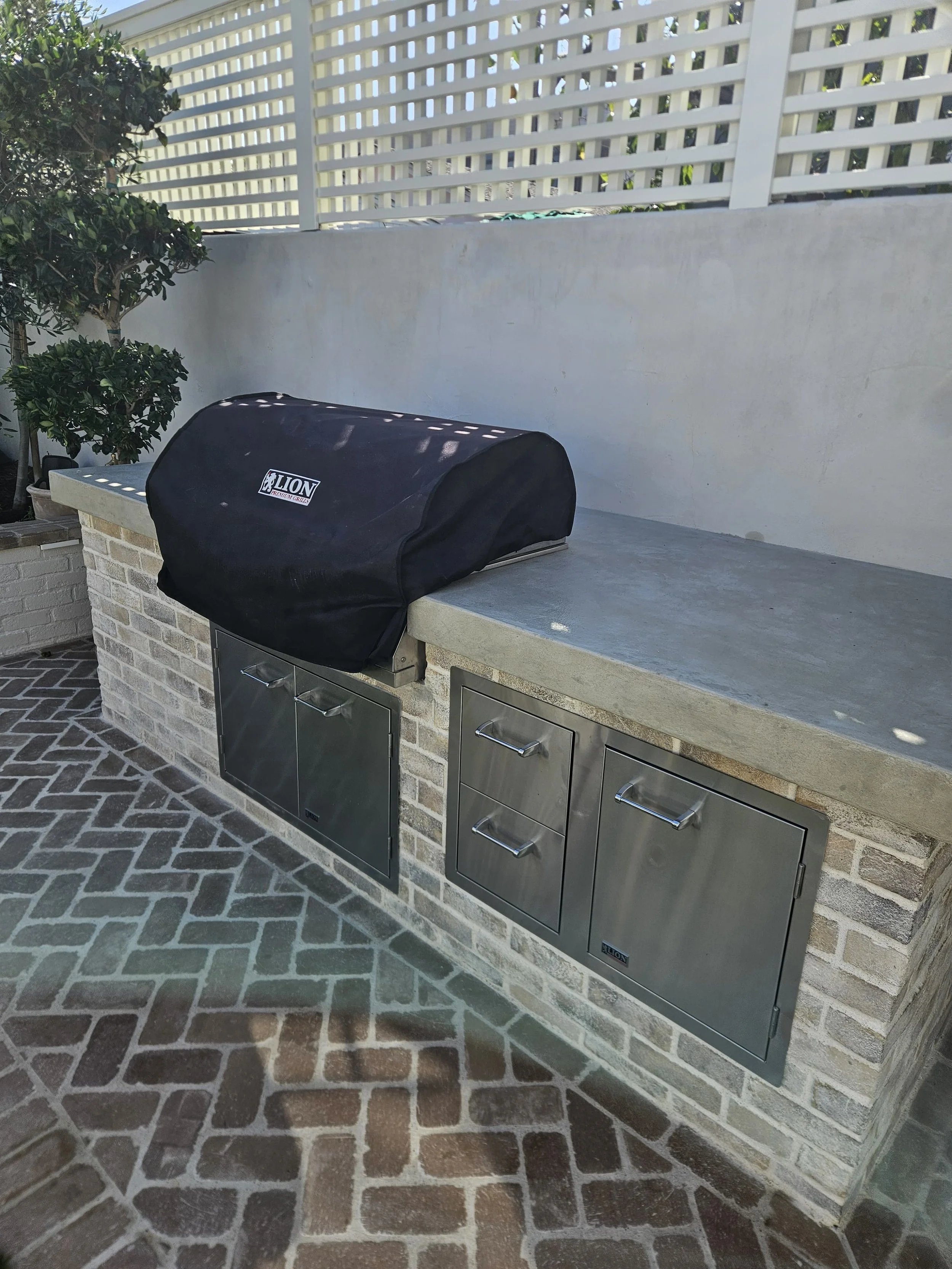 Micro cement works well for outdoor projects too. This barbecue countertop was coated and now ready for year round use.