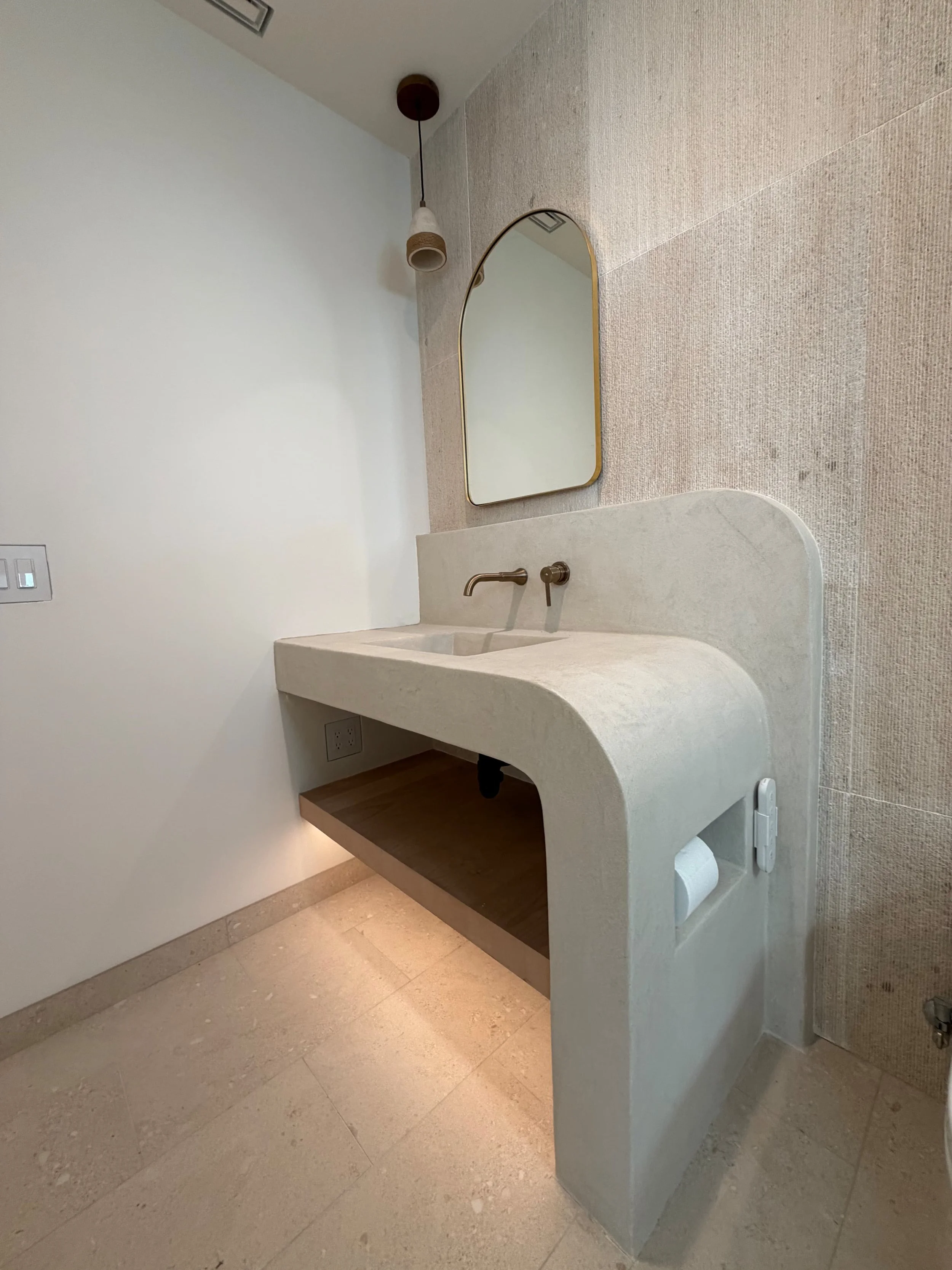Integrated vanity and sink fully coated.