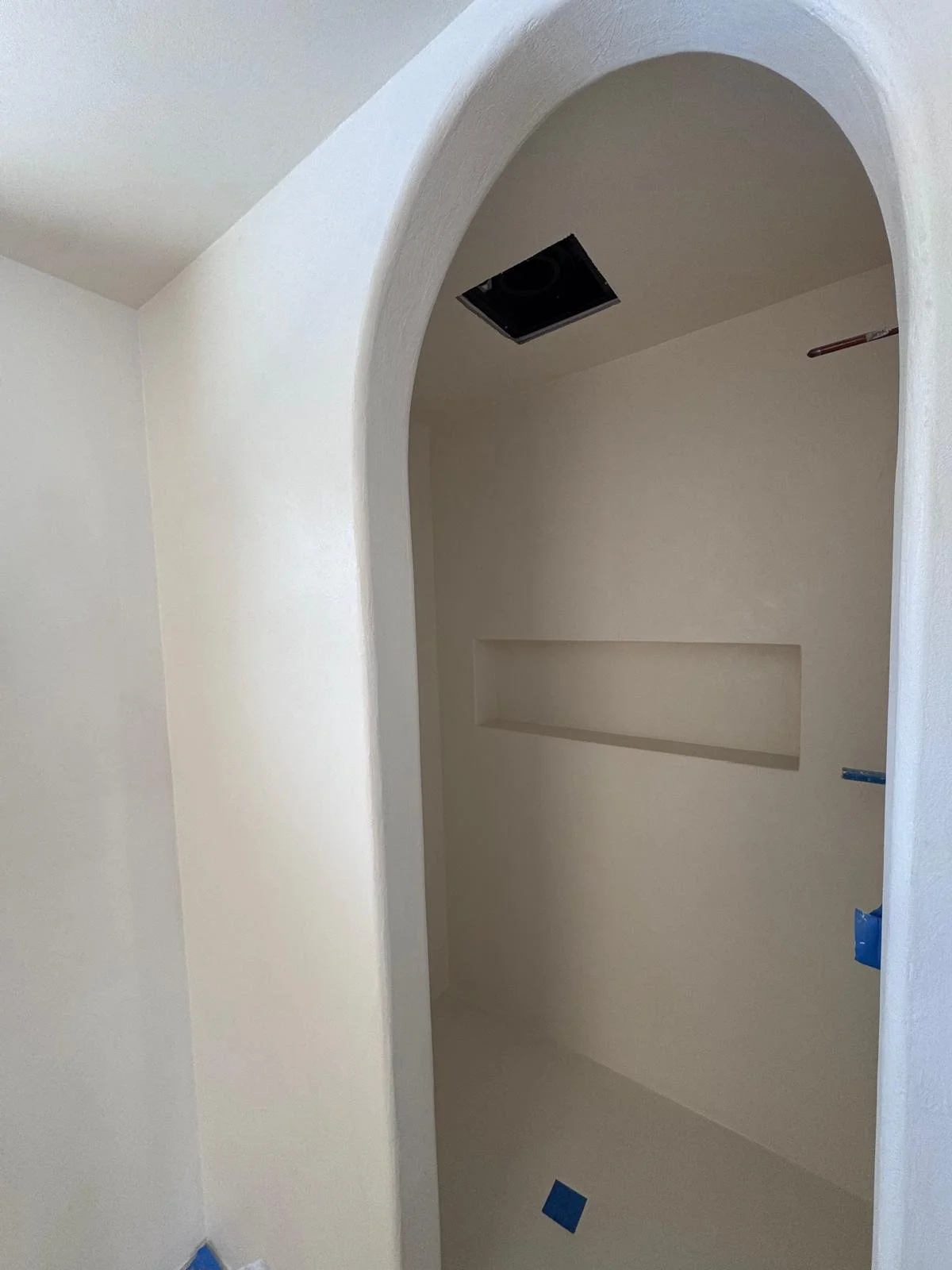 Fully coated shower and vanity area.