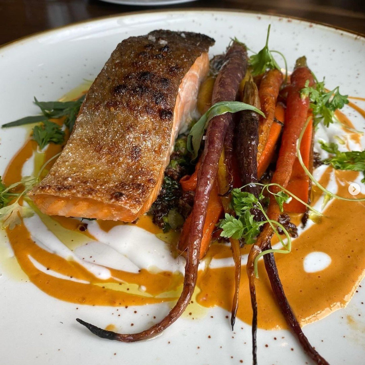 If you're looking for something sweet, spicy, smokey and springy, check out this dish by Chef Marc Sheehan at Northern Spy in Canton: Loch Duart Salmon, grilled over an oak-fueled hearth, with cider roasted rainbow carrots, baked quinoa and pea green