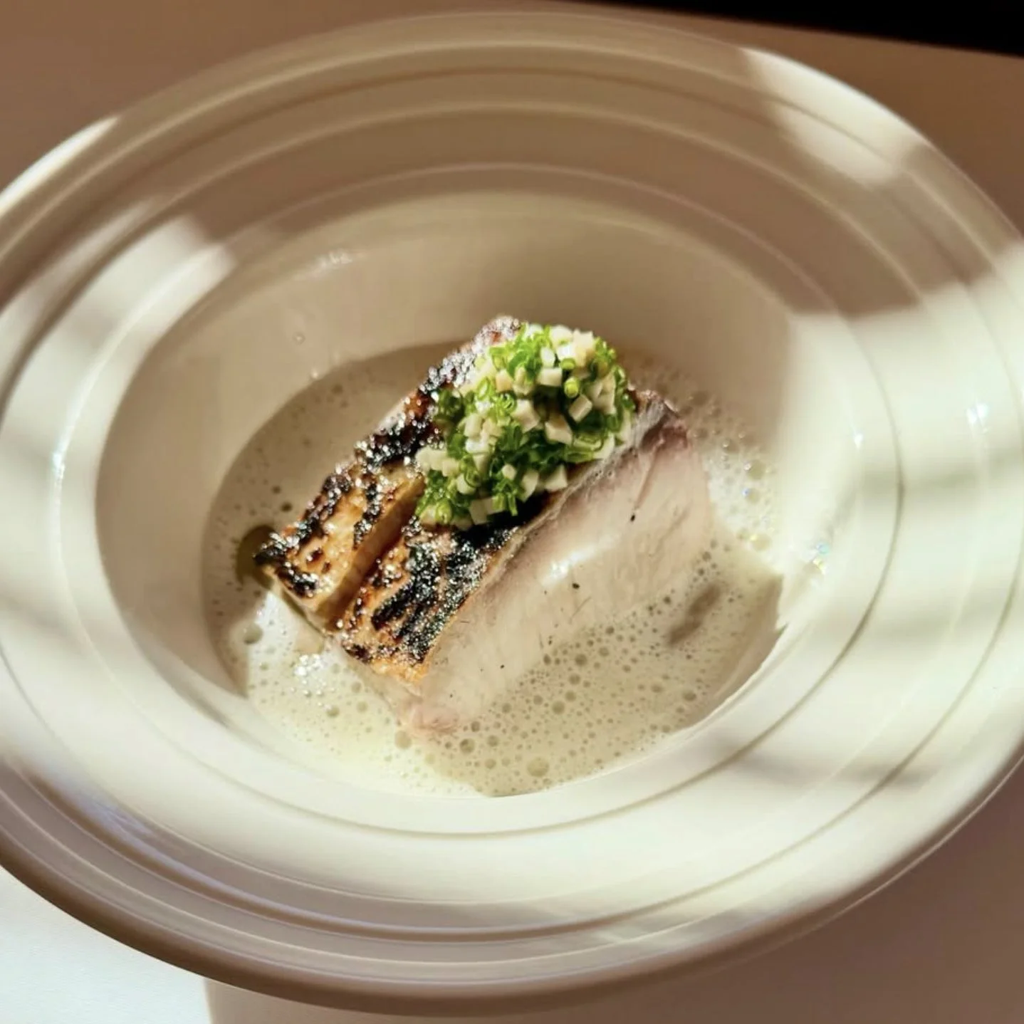 Spear-caught Florida cobia, porcini, hakurei turnip from Chef Brian Mejia at Junior in Nashville. 
#cobia #nashvillechef #wulfsfish #newfisholdschool