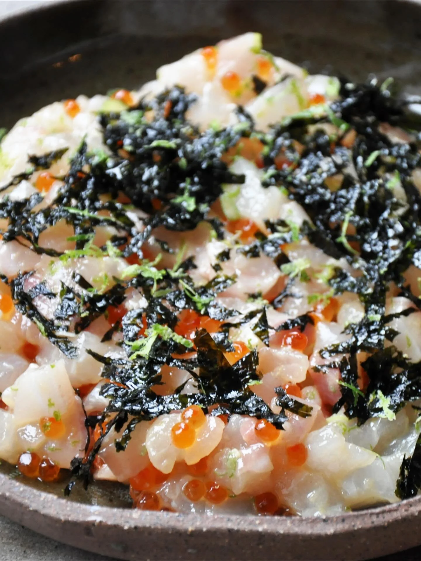 Tartare of loup de mer, nori vinaigrette, trout roe by Chef Eric Korsh of CRU in Nantucket, prepared in the Wulf&rsquo;s test kitchen.

The fish is Great Atlantic Sea Bass (Dicentrarchus labrax) raised in the rough, deep waters off the Canary Islands