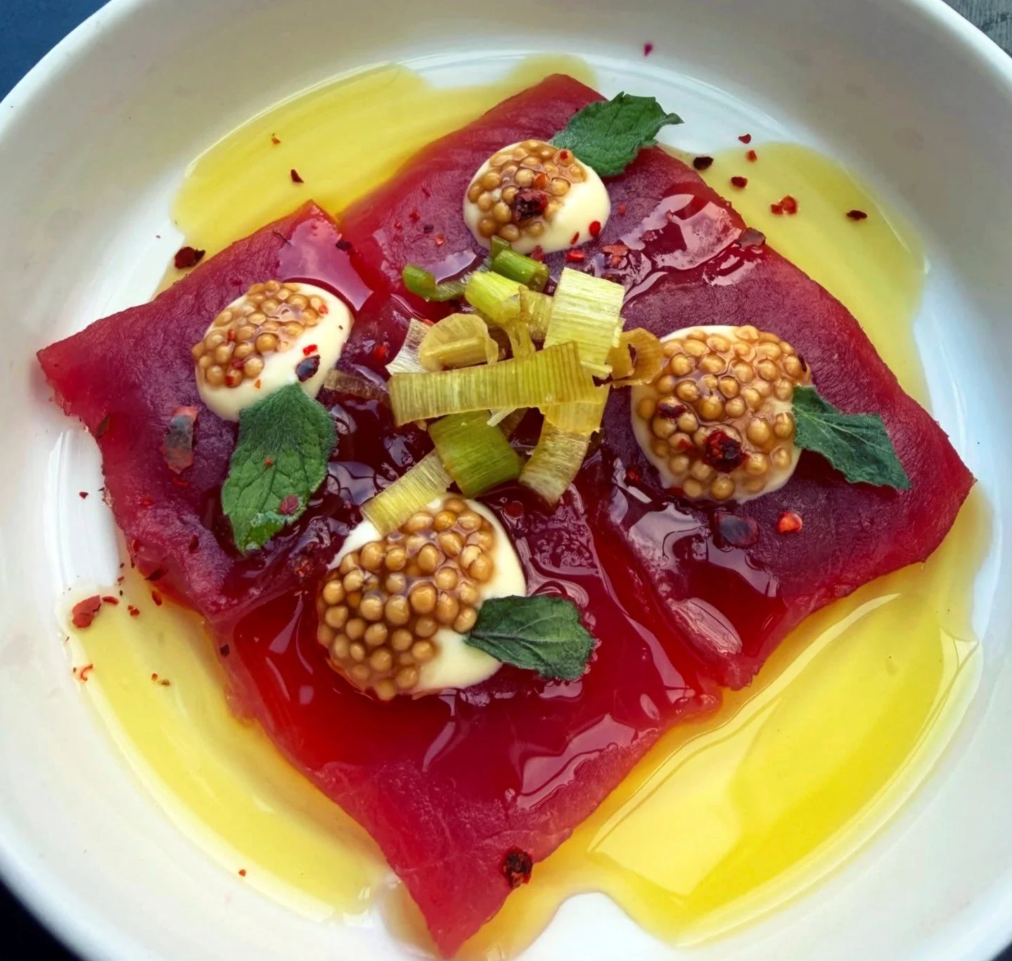 TUNA 🎣 TUESDAY at Viale in Cambridge. ⁠
⁠
Lemon emulsion, grapefruit mint, pickled mustard seed, crispy leek⁠
⁠
#tuna #tunatuesday #bostonchefs #wulfsfish