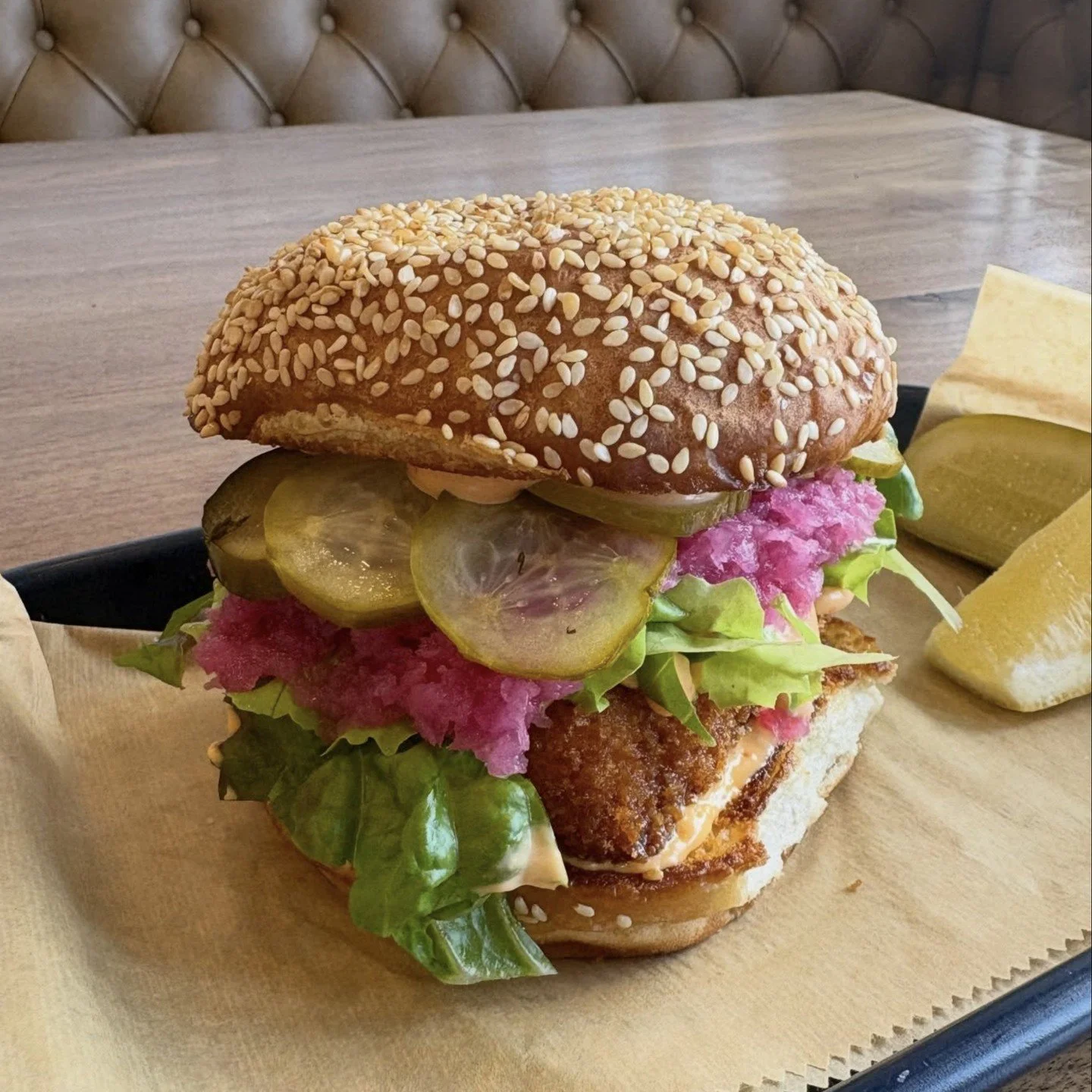 A great fish sandwich is hard to beat, like this beauty that just hit the Holdfast menu: Breaded local fish, Calabrian chile remoulade, lettuce, and pickles tucked between a sesame potato roll!⁠
⁠
Get yourself to Allston to try one.