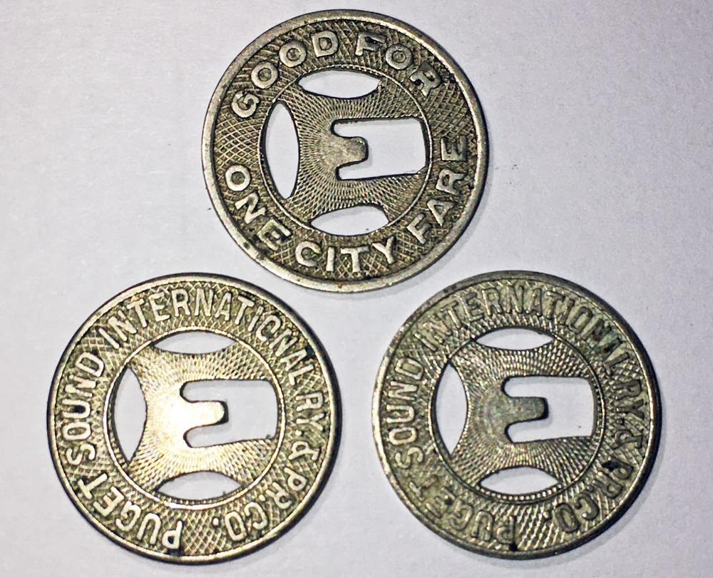  Tokens for the Puget Sound International Railway Co., which operated Everett’s streetcar network in 1907.  The tokens are now part of the collection of Bob Mayer. 