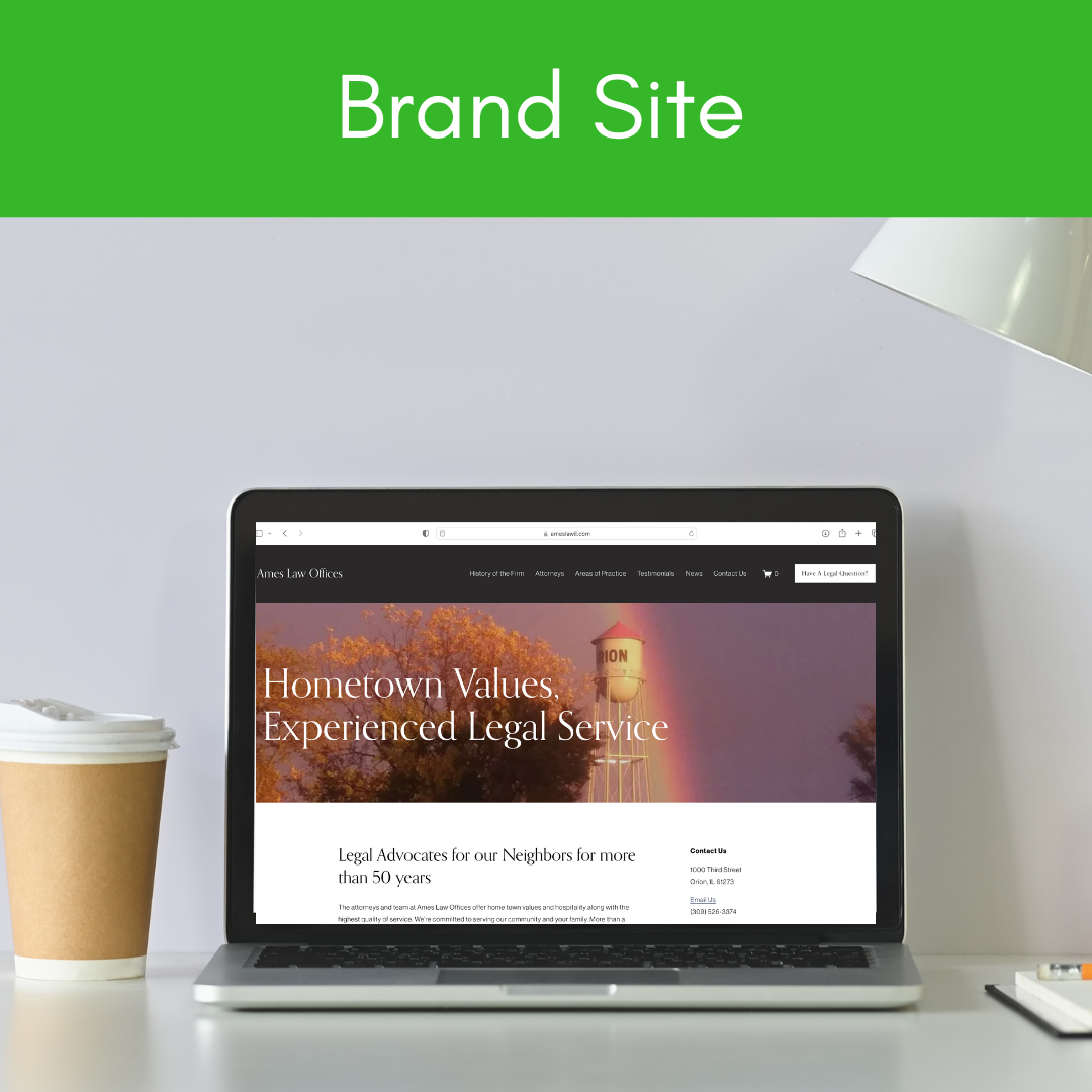 A laptop displaying a law office website with the headline "Hometown Values, Experienced Legal Service" on a white desk, with a coffee cup to the left and a bright lamp to the right, against a plain wall background. The top green banner reads "Brand Site."