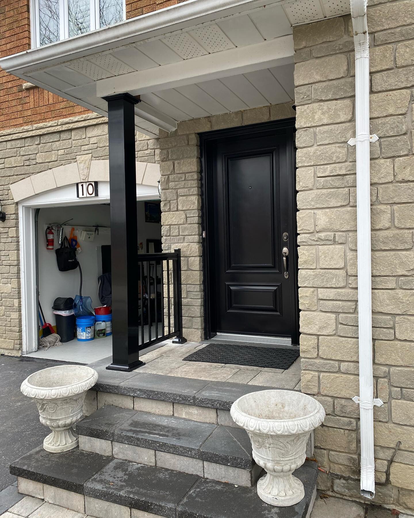 A Black 6&rdquo; column with a simple picket put the finishing touch on this exterior renovation in Brampton