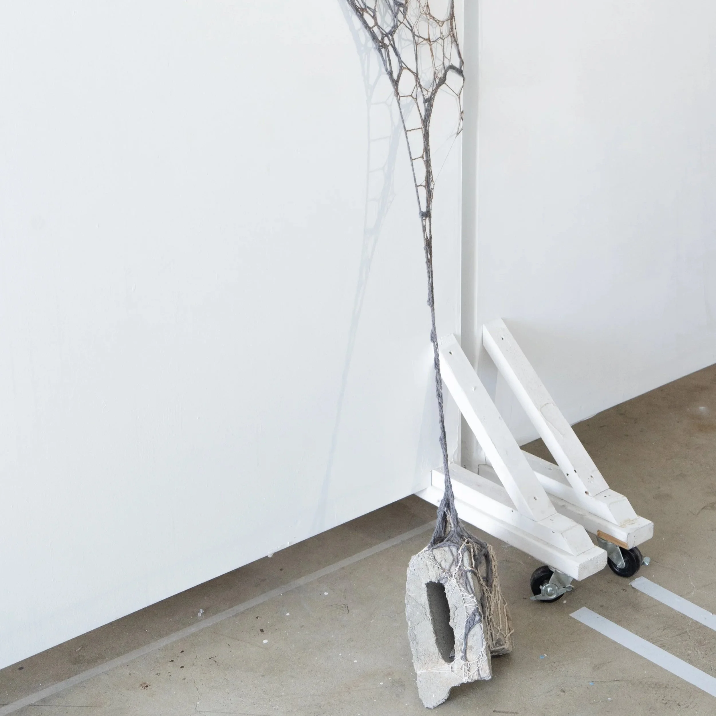 'Arachnea'
Concrete Breeze Block Fragment, Wool Yarn, Cotton Lace Weight Yarn, and Spun Alpaca.
Mixed Media Textile Installation.