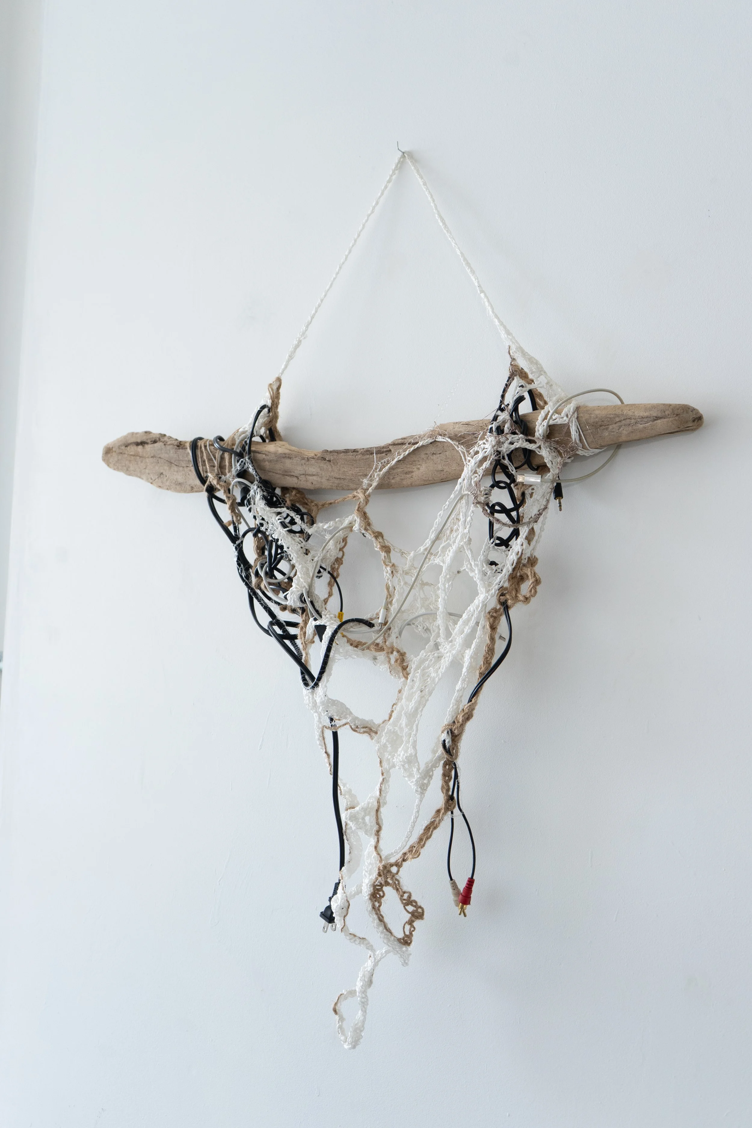 'Untitled'
Driftwood, Discarded Electrical Cords, Nylon Cording, Twine, Fishing Line, and Spun Alpaca Fiber.
Wall Hanging Textile Sculpture.
Driftwood from The Rockaways – Queens New York.