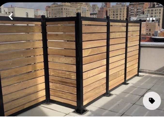 Pressure treated privacy wall on Powder Coated Aluminum posts.