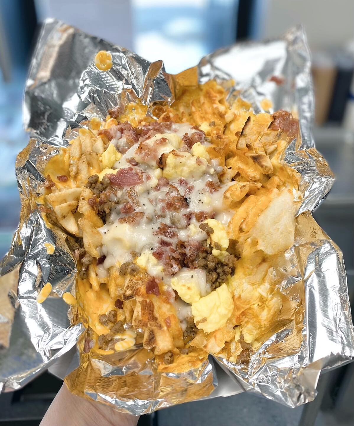 $2 off Breakfast Fries - today only! (3/24)

What are breakfast fries, you ask?:
Crispy waffle fries smothered in country peppered gravy, Colby-Jack cheese, bacon, sausage, and scrambled eggs! 

🦬 🌶️ Delicious with a side of Buffalo sauce! 

#break