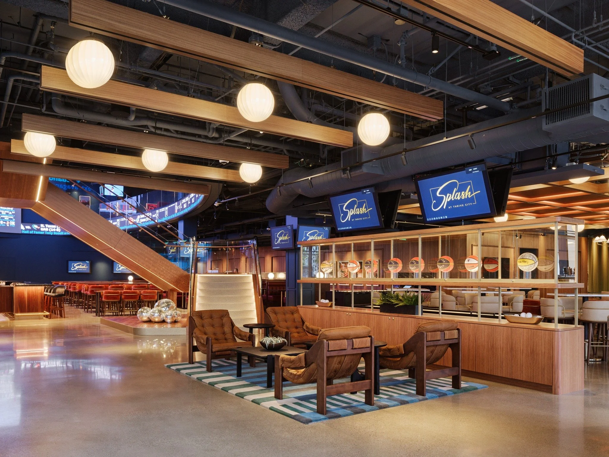 Designed as an immersive social destination adjacent to Chase Center, Splash blends layered architectural lighting, integrated media, and warm materiality to redefine the modern sports bar experience. Restrained ambient illumination, luminous archite