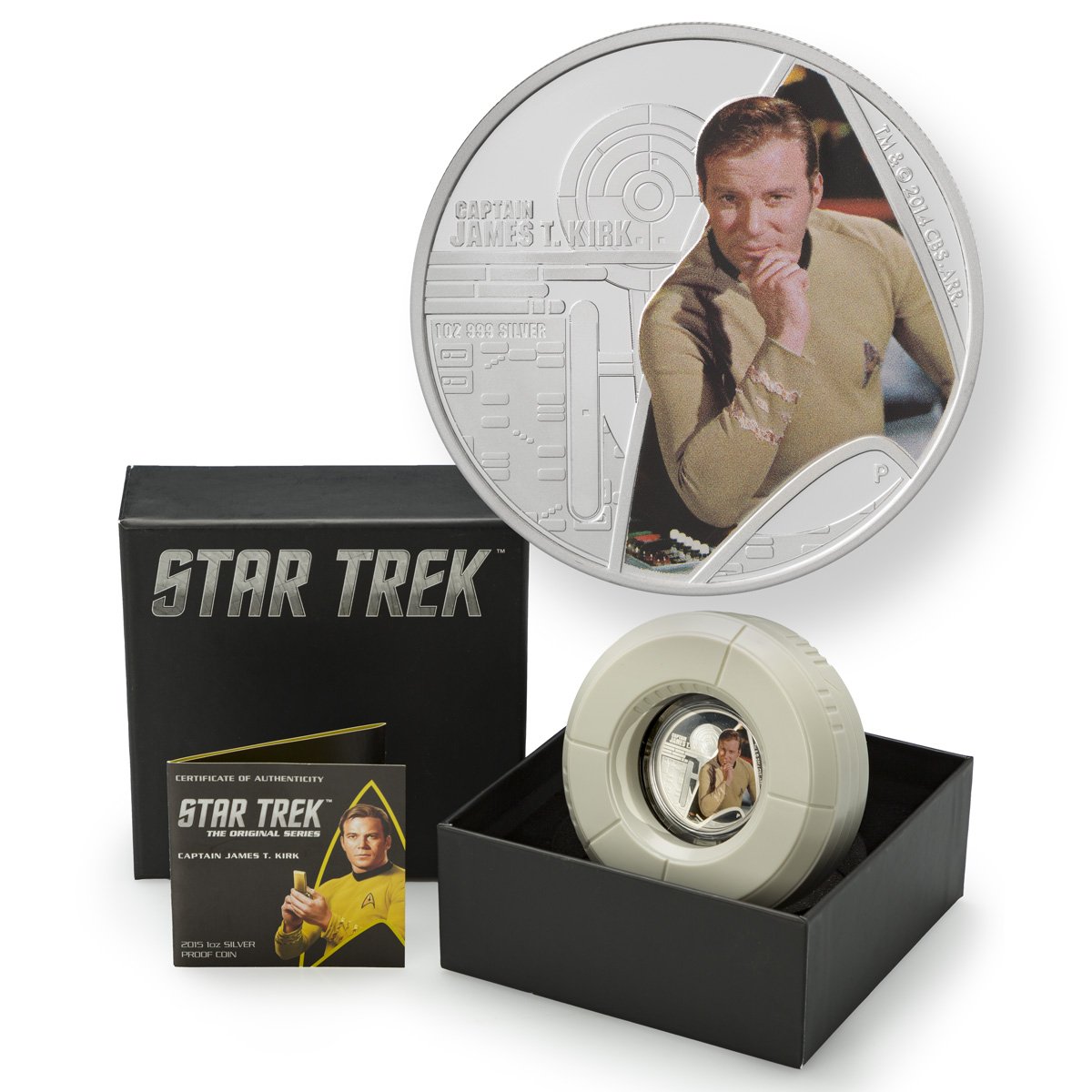 A Star Trek commemorative coin featuring Captain James T. Kirk in a display case, with a certificate of authenticity.