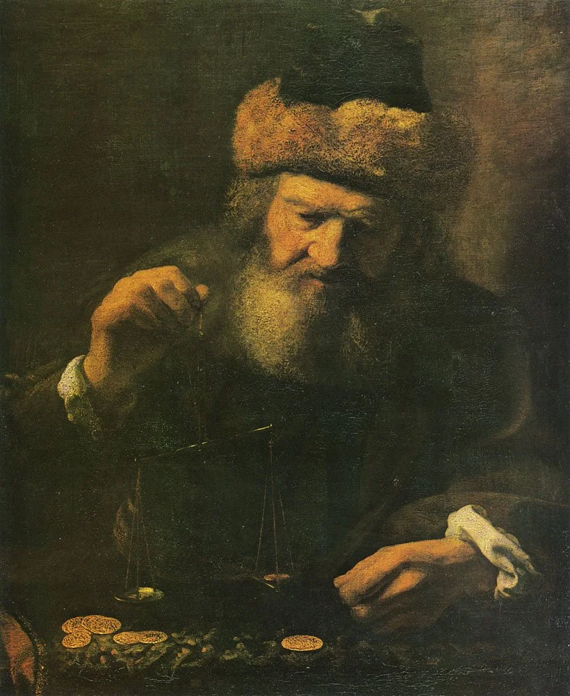 A man weighing gold