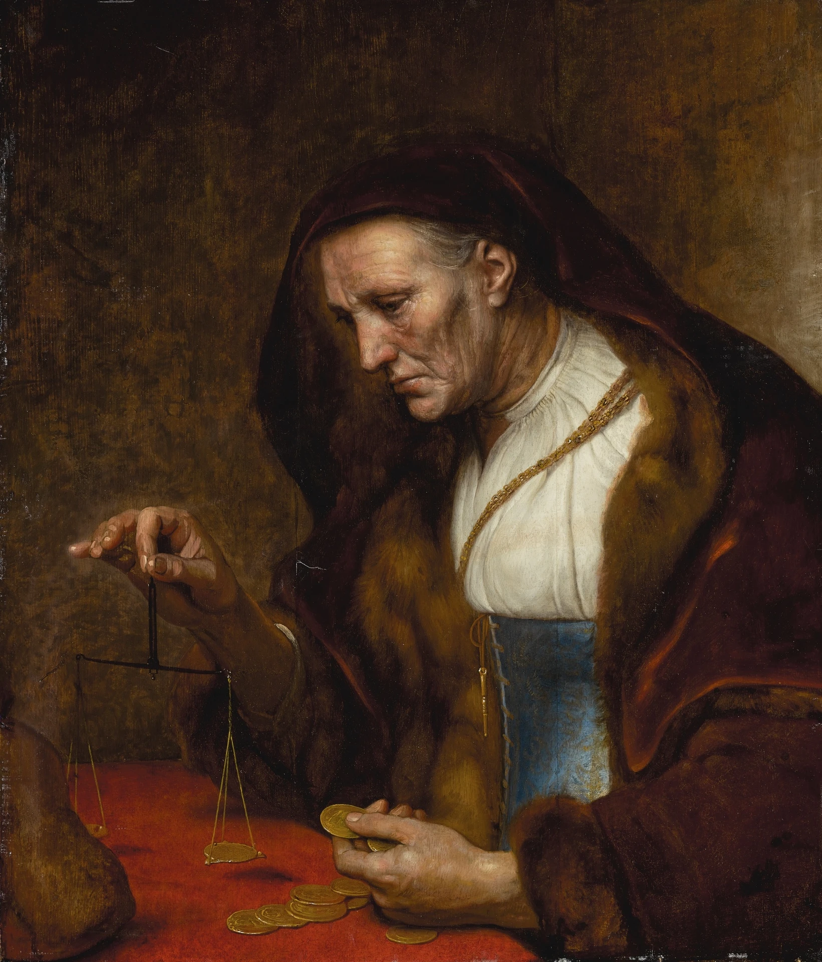 An old woman weighing gold coins-Rembrandt van Rijn-1647 -oil on panel.