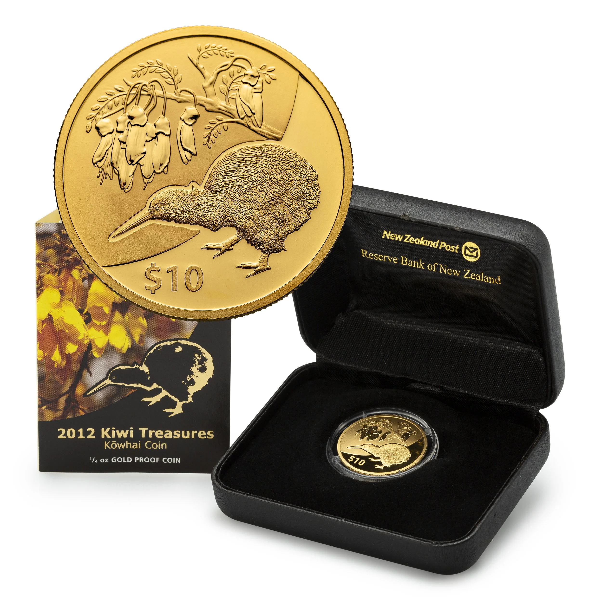 A New Zealand $10 gold coin featuring a kiwi bird and kowhai flowers, accompanied by a display box and protective case from the Reserve Bank of New Zealand, labeled "2012 Kiwi Treasures Kowhai Coin."
