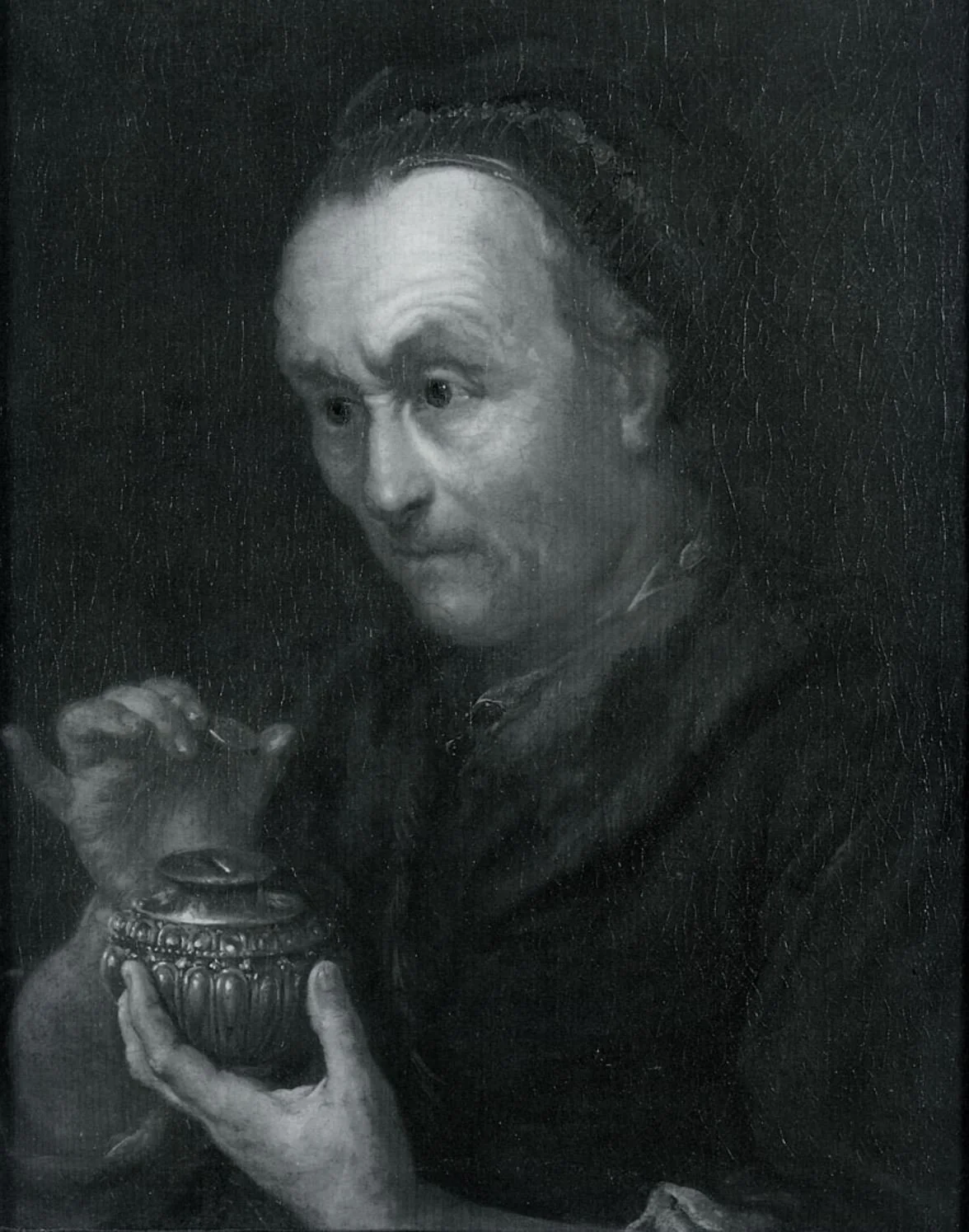 Old Woman, an allegory on greed by The Monogrammist I.S., an unknown and elusive figure who worked in the circle of Rembrandt and is believed to have worked in Leiden in the 1630s.