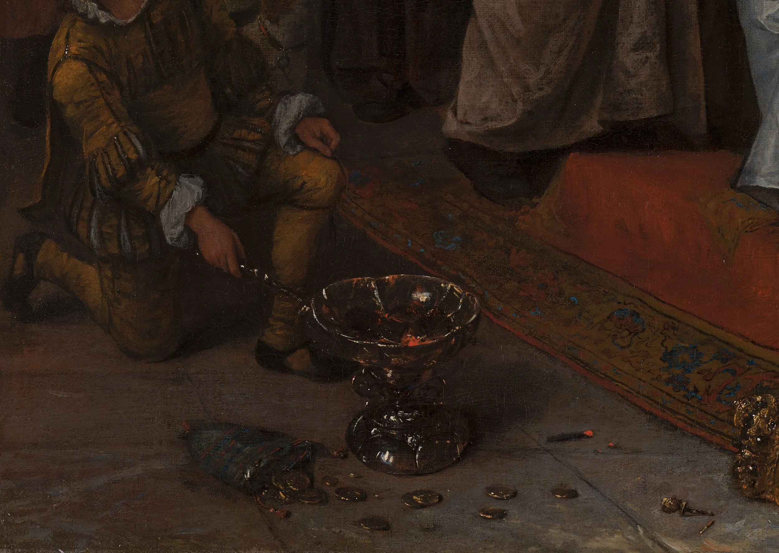 Moses and Pharaoh's Crown- close up of The coal and coins are spilt on the floor. The pouch of gold pieces are in the shape of coins, though "coins" didn't exist at the time. 