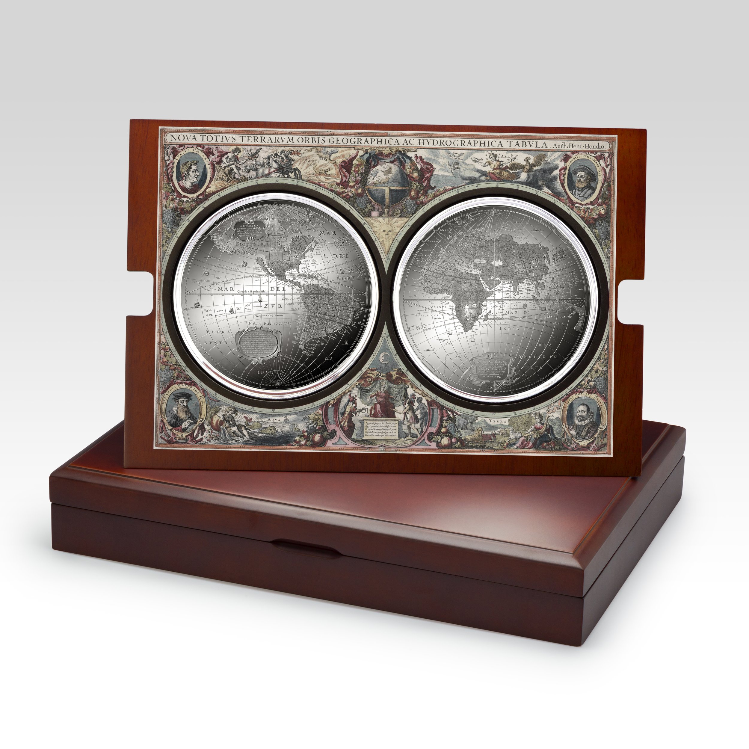 Antique dual globes with a vintage map design, mounted on a wooden stand, on a white background.