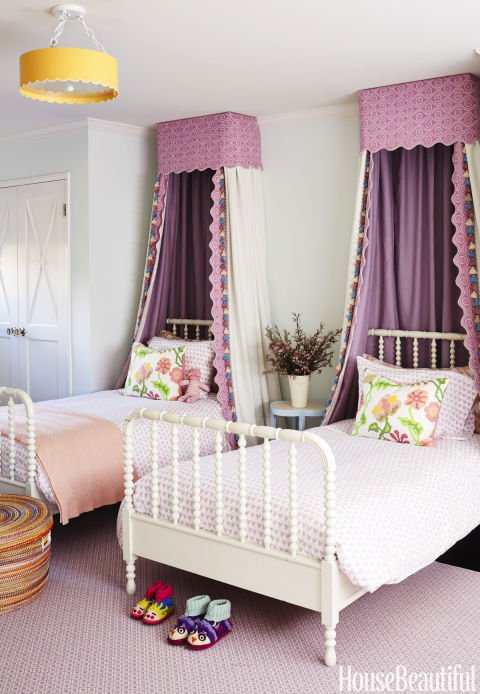  How sweet is this little girls room? The canopies and the coverlets made from  Raoul Textiles &nbsp;are beautiful but not too fussy together. &nbsp;And I love the double twin bed look - perfect for sleepovers.  Image via  House Beautiful . 