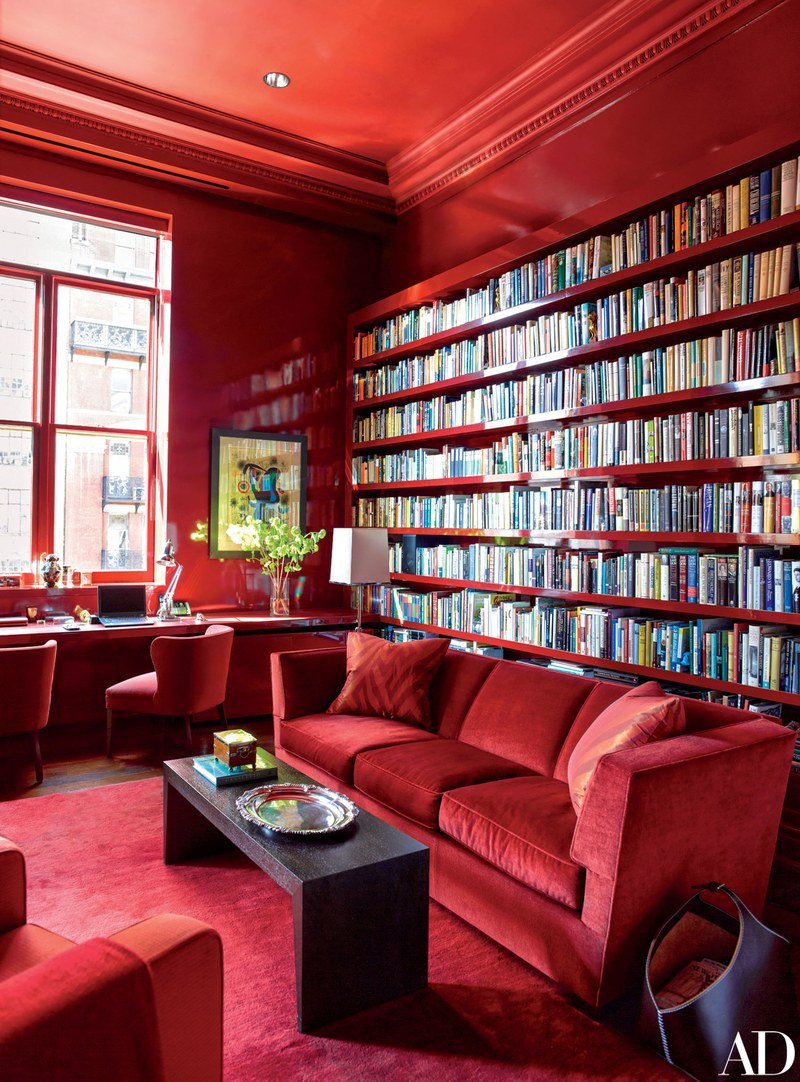  Another monochromatic red room, this time in Manhattan. &nbsp;I'm also a sucker for a built-in bookcase.  Image via  Architectural Digest  