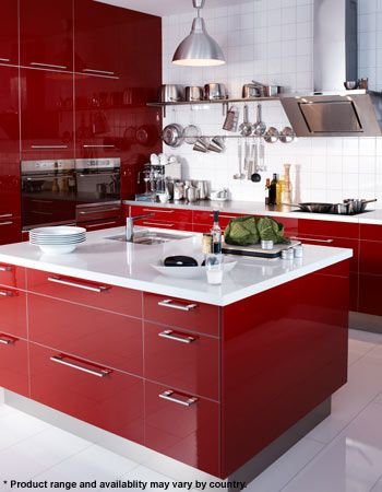  My brother actually had these glossy, red Ikea cabinets in his old apartment. &nbsp;He paired them with a butcher block countertop and it was really a beautiful, warm, and modern space.  Image via  Ikea  