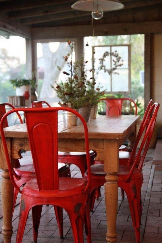  I love adding a pop of red in a dining space with chairs. &nbsp;These marais chairs paired with this wooden table gives off a Parisian country vibe.  Image via  Tumblr.  