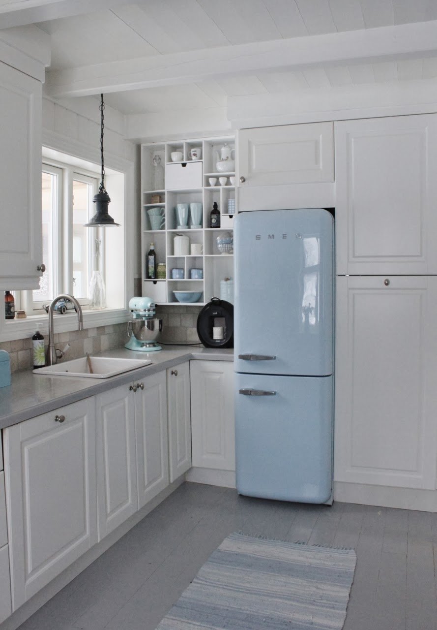  Last but not least, this kitchen brings the blue in via the retro  Smeg  refrigerator and accessories. &nbsp;It's also a fun and unexpected way to add some color to a kitchen.  Image:&nbsp; Mia's Interiors  