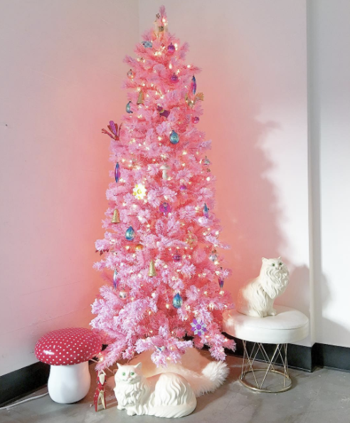  I can't even get over how kooky this tree is. &nbsp;I'm also a sucker for anything with a fluffy white cat since it reminds me of our late Daisy cat (may she rest in peace.)  Image via  Domino &nbsp;and  Little Arrow Shop  